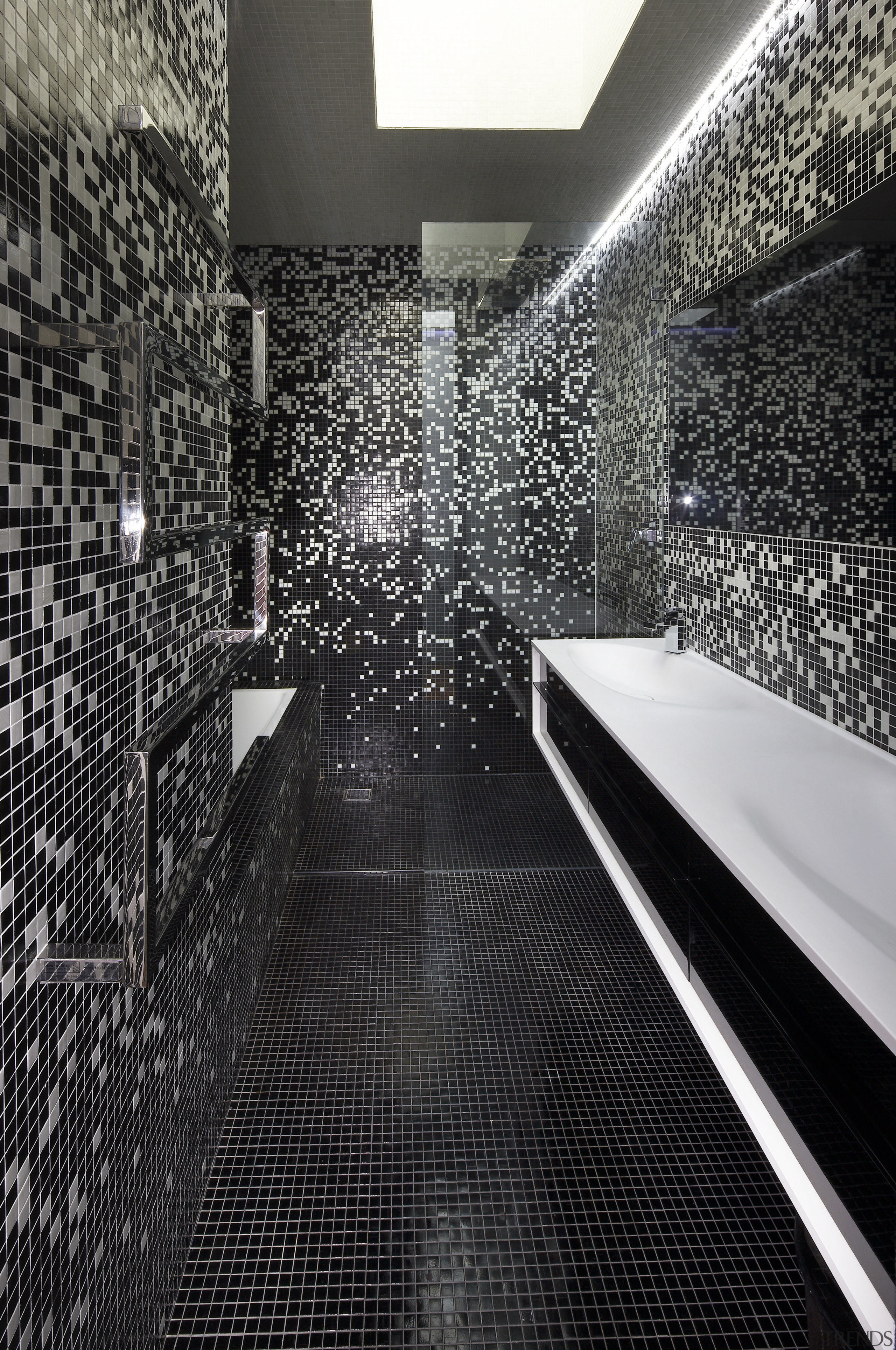 The black and white mosaic pattern in this architecture, black, black and white, design, flooring, light, monochrome, monochrome photography, reflection, structure, wall, black, gray