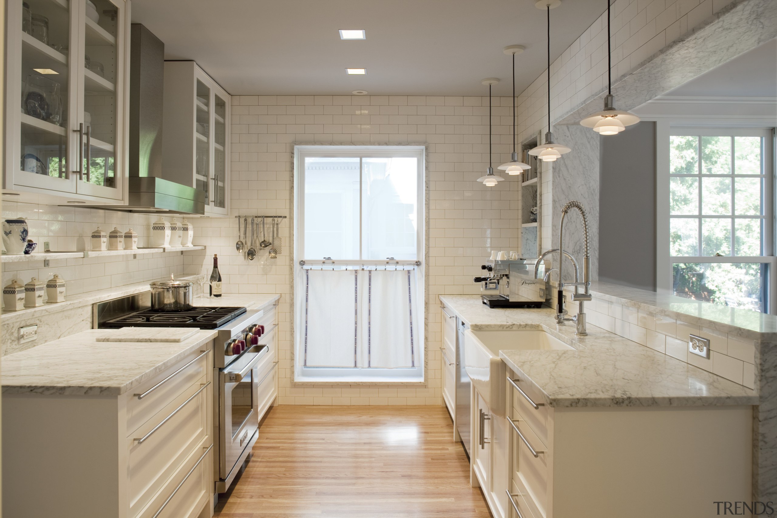 Seen here is a kitchen which was remodelled cabinetry, countertop, cuisine classique, floor, flooring, hardwood, home, interior design, kitchen, real estate, room, wood flooring, gray