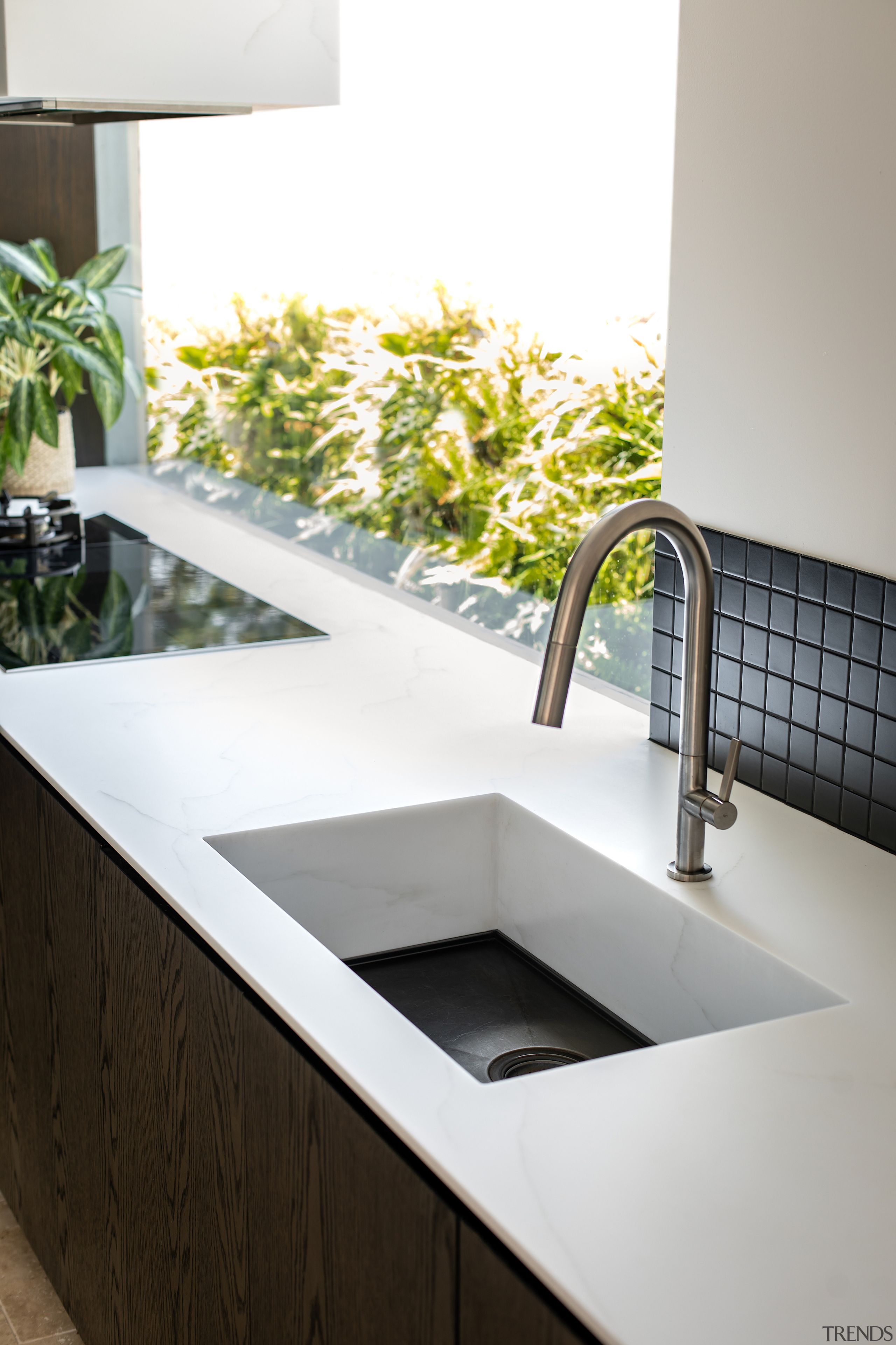 The prep sink features Staron Cotton White returned 