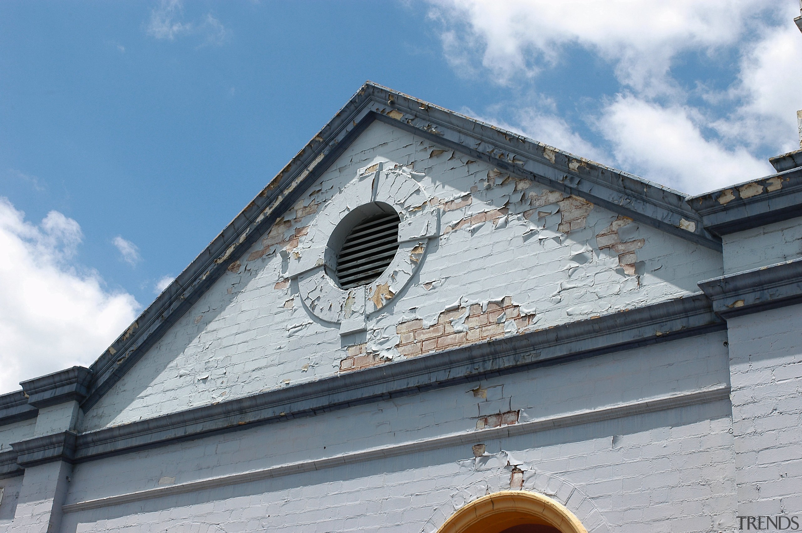A view of an exterior restoration carried out architecture, building, facade, landmark, roof, sky, gray