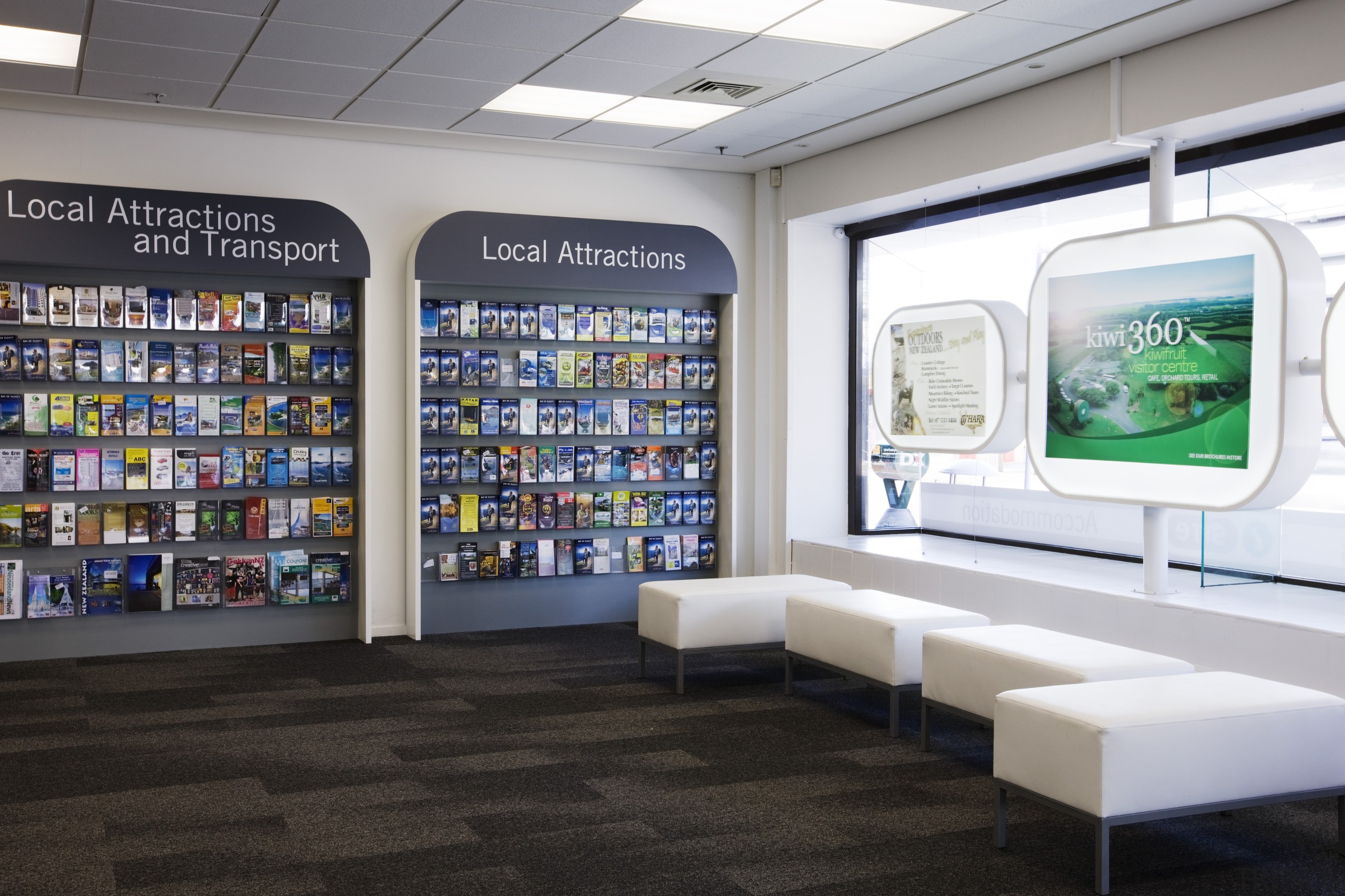 Eye-catching graphics and illuminated display boards are features institution, product, retail, technology, white, black