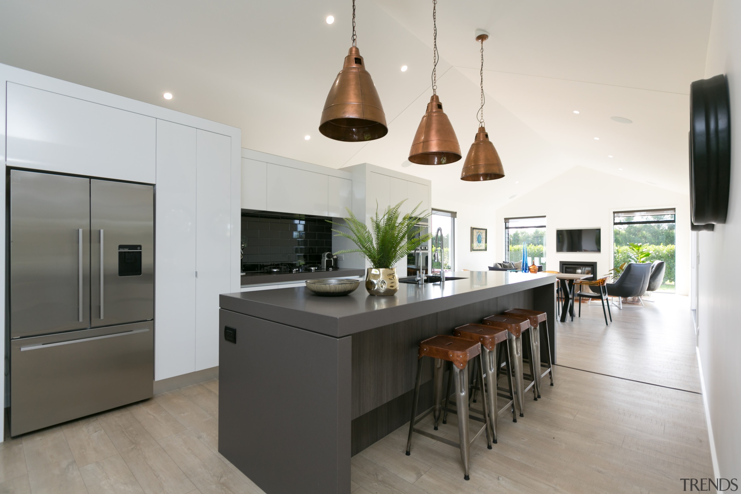 Feature metal pendants set off this designer kitchen countertop, cuisine classique, interior design, kitchen, white, gray