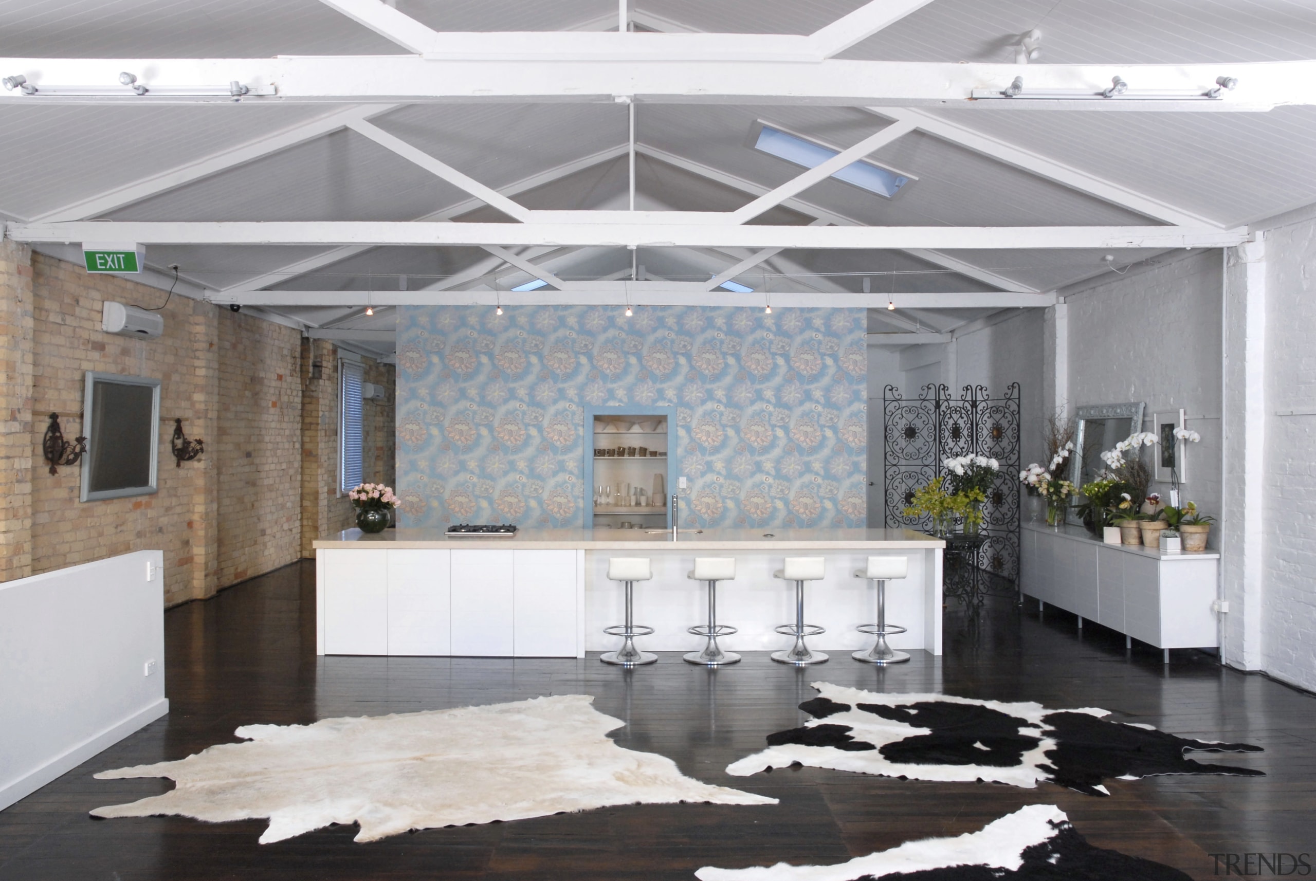 This kitchen is used for everyday living as ceiling, interior design, lobby, loft, white, gray