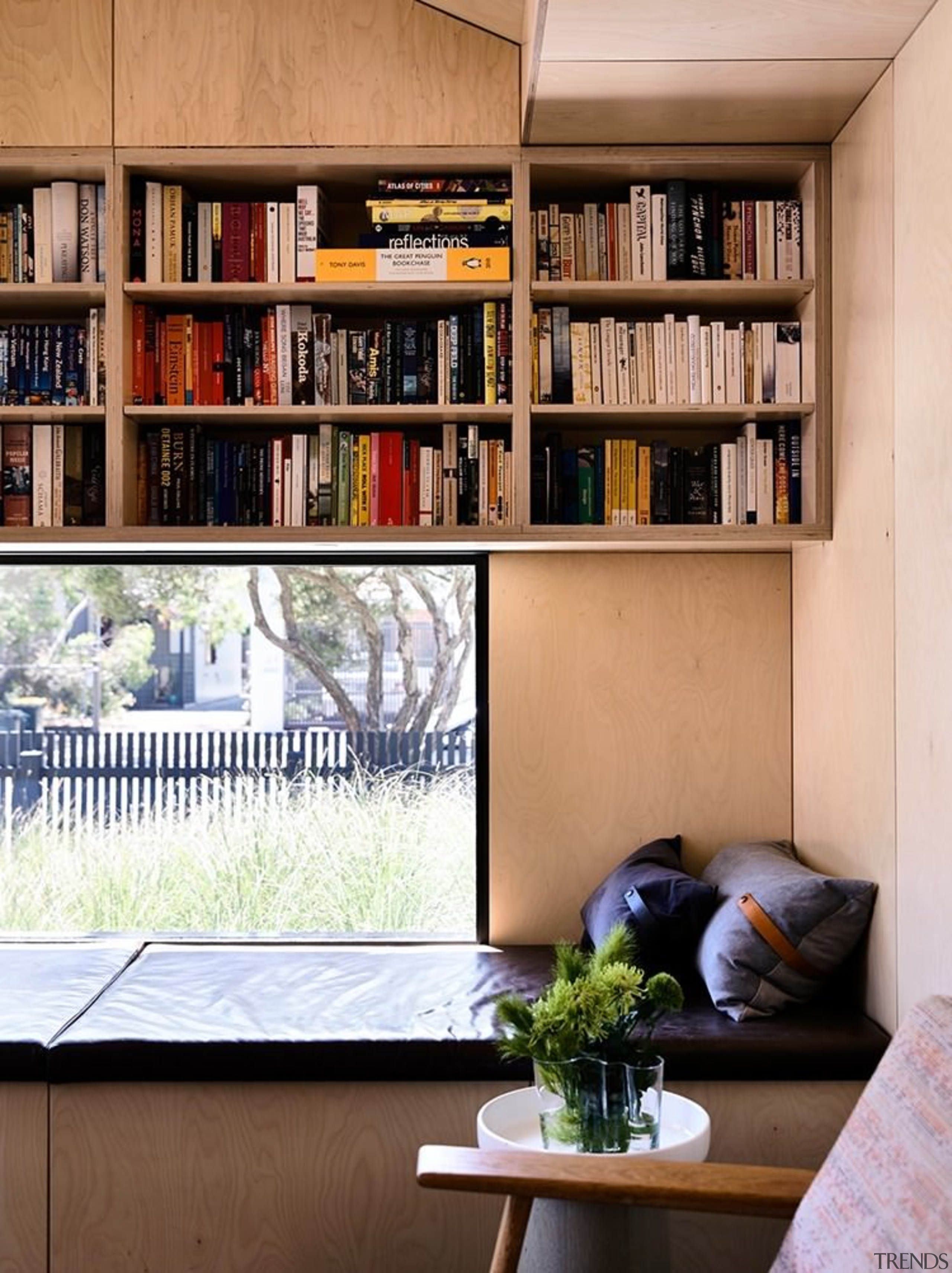 This bookshelf is compact and packed in above bookcase, furniture, home, interior design, living room, shelf, shelving