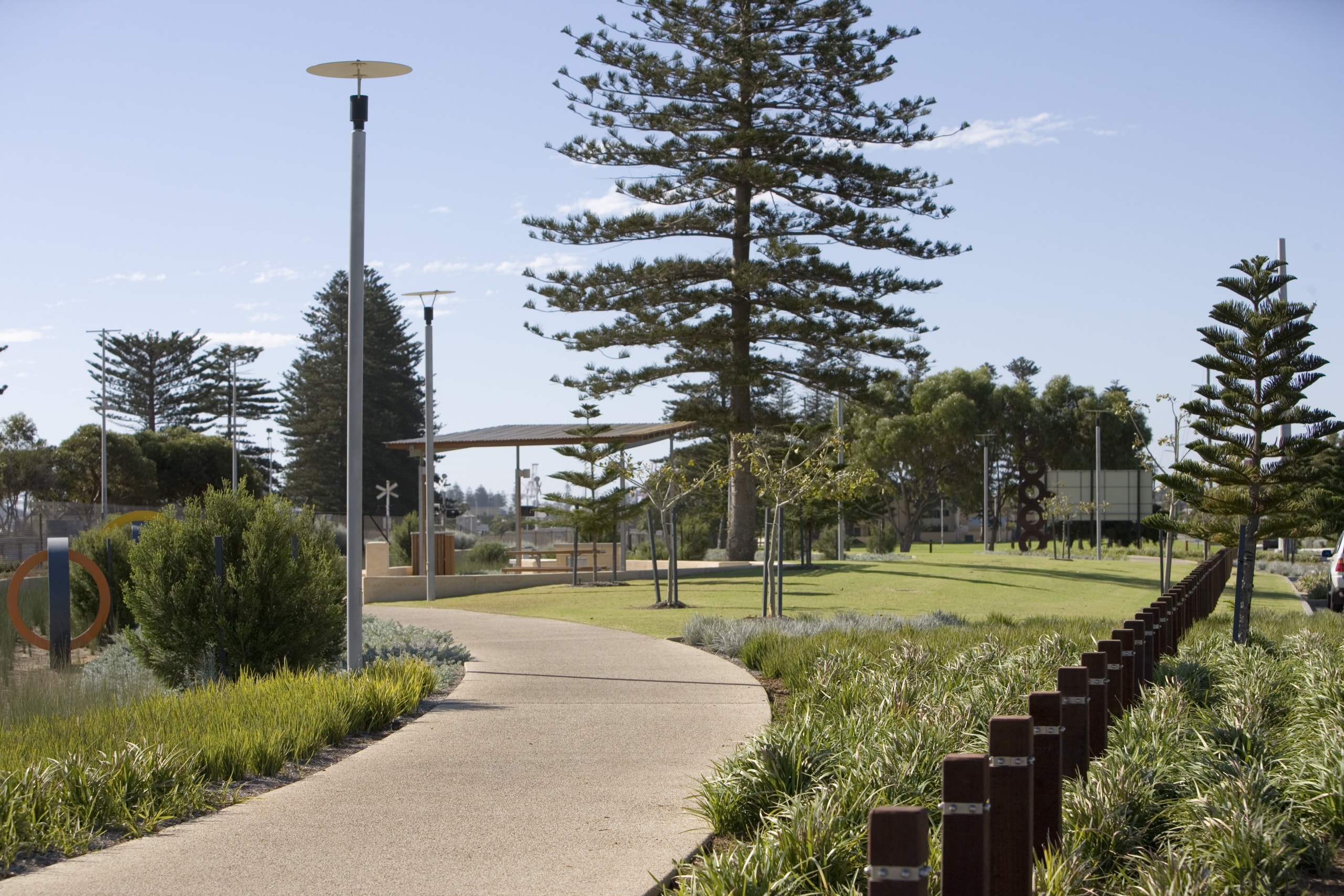 View of LandCorp developments in South Beach, Western park, recreation, tree, walkway, teal, brown