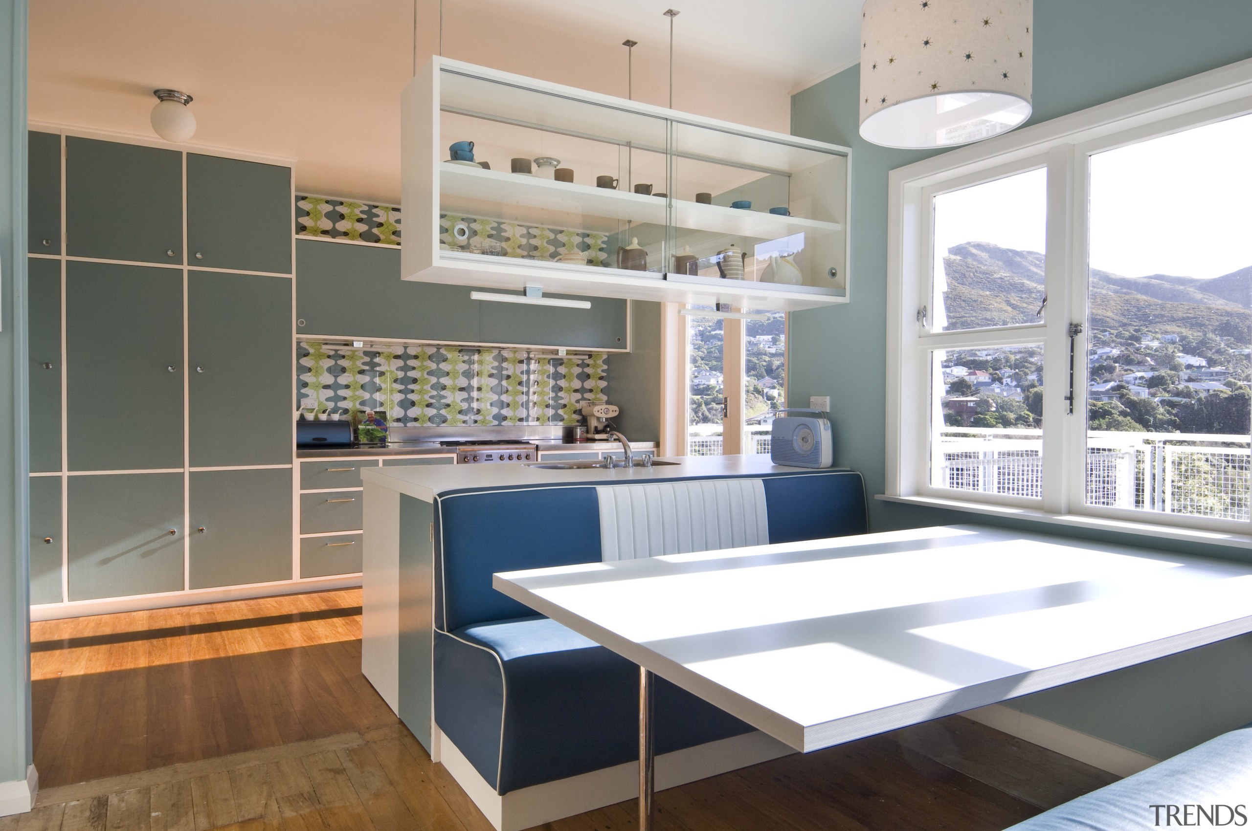 View of a kitchen which features blue cabinetry interior design, kitchen, window, gray, white