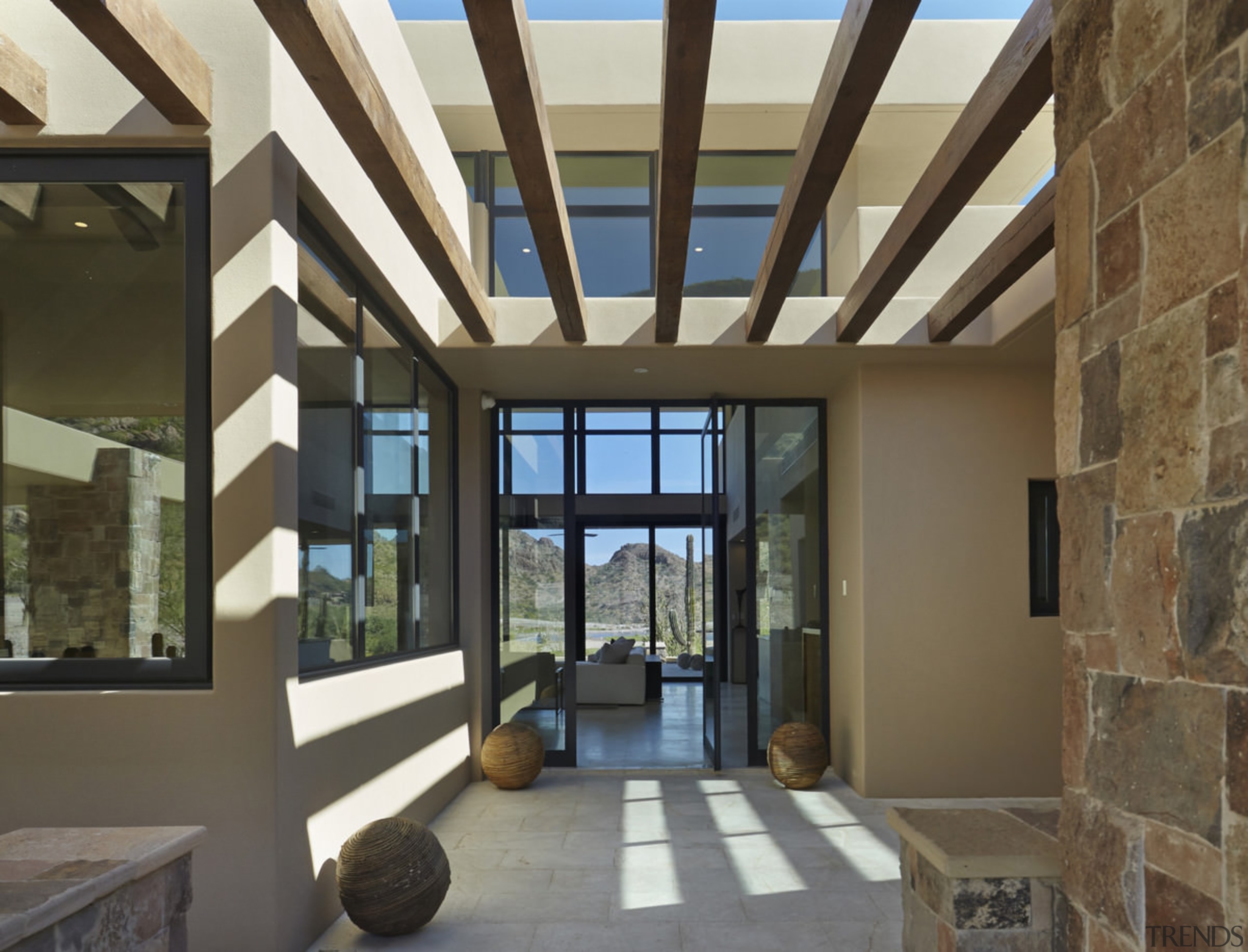 Wood beams break up harsh desert sun - daylighting, estate, interior design, property, real estate, roof, window, black, brown
