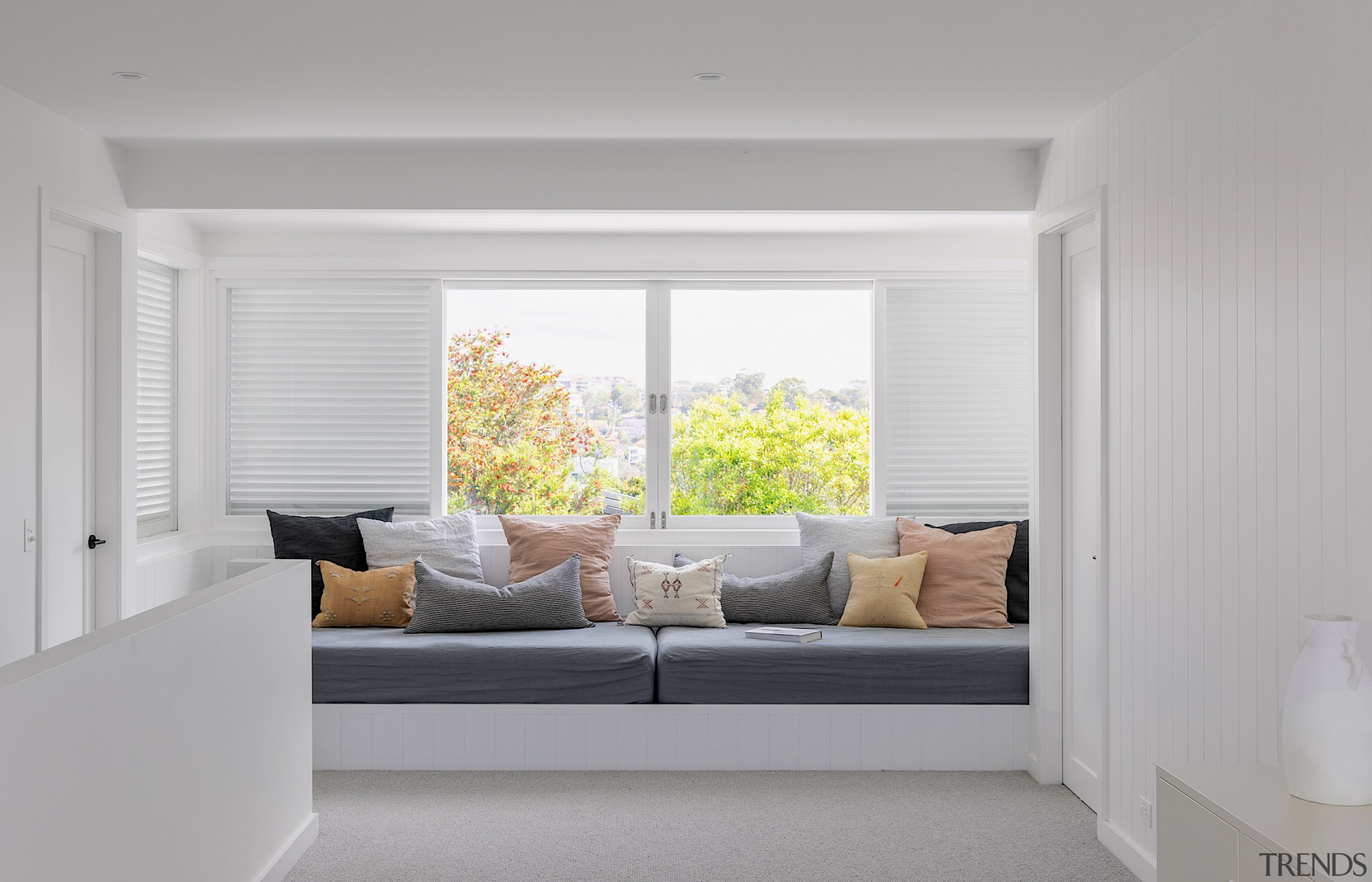 Upstairs family space with day bed nestled in 