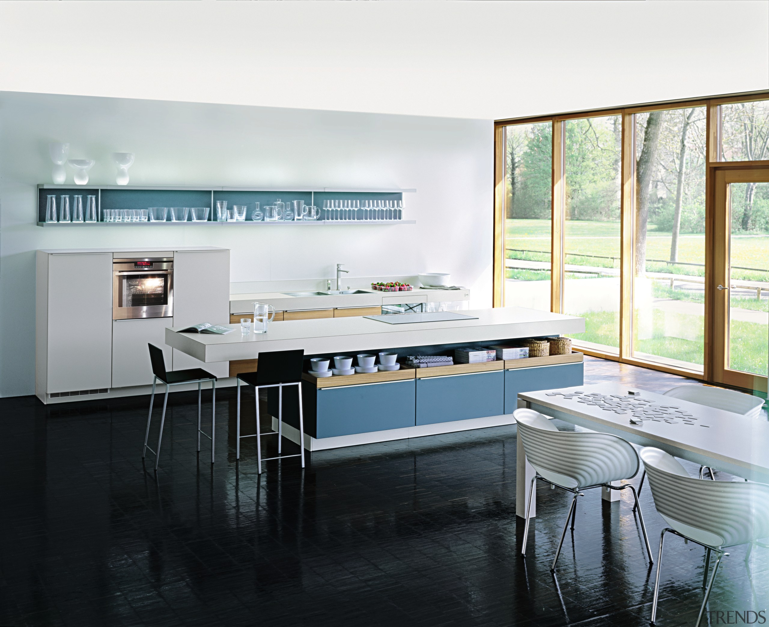 A view of some kitchen appliances from AEG. countertop, interior design, kitchen, room, window, white, black