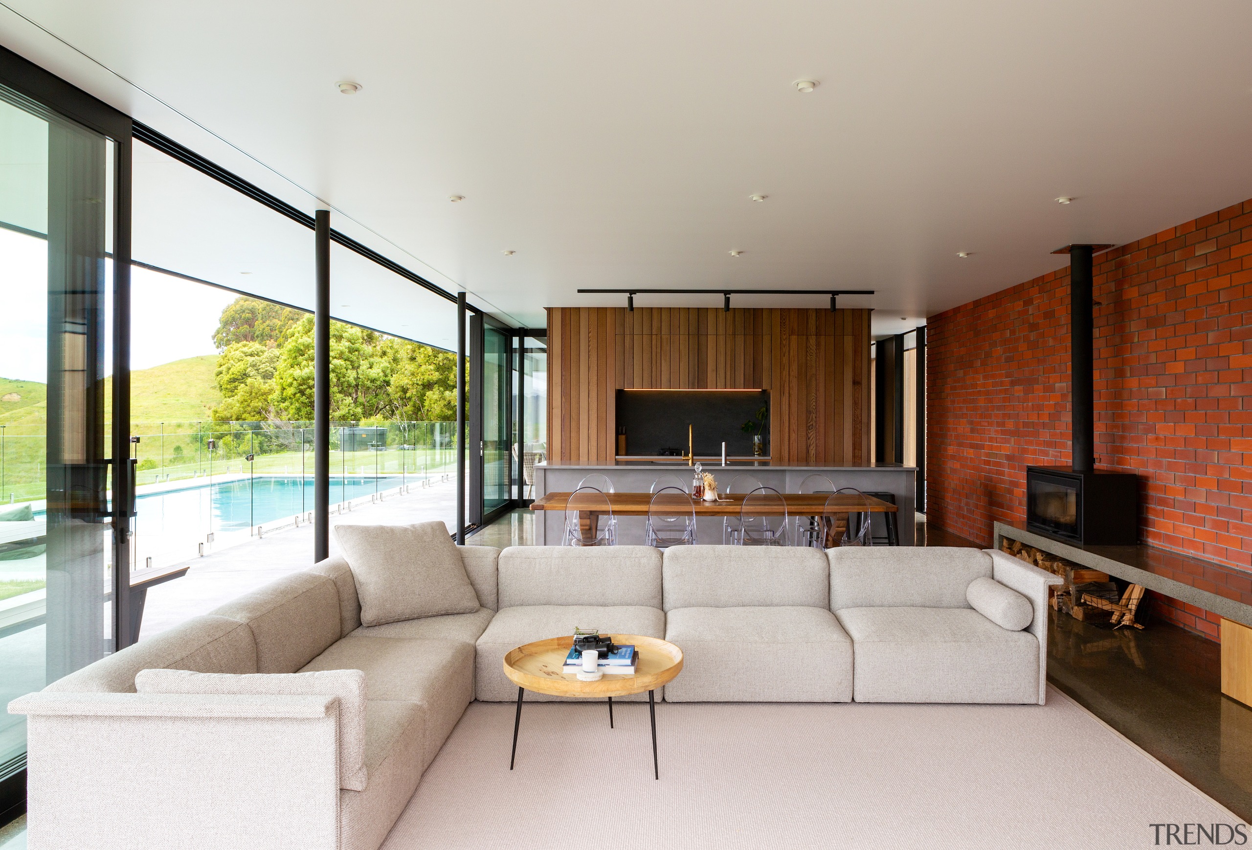 Living area with a wall of glass on 