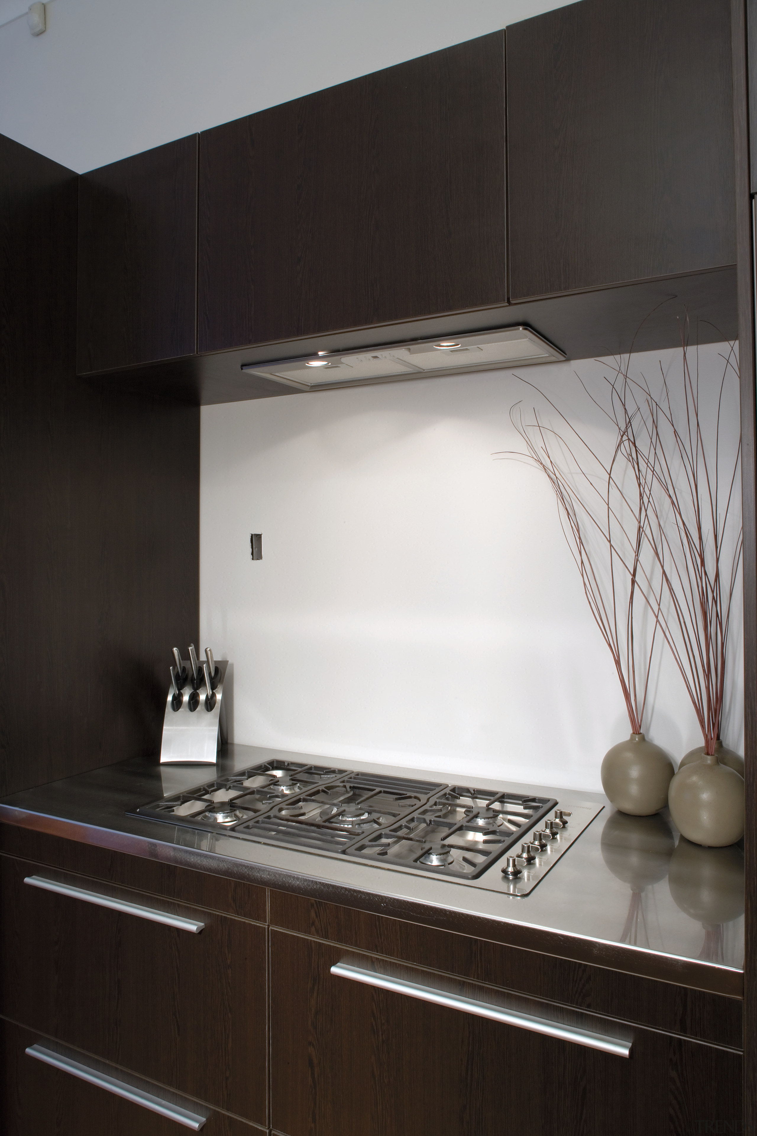 A view of the modern Smeg stainless steel architecture, cabinetry, countertop, home appliance, house, interior design, kitchen, light fixture, room, sink, under cabinet lighting, black