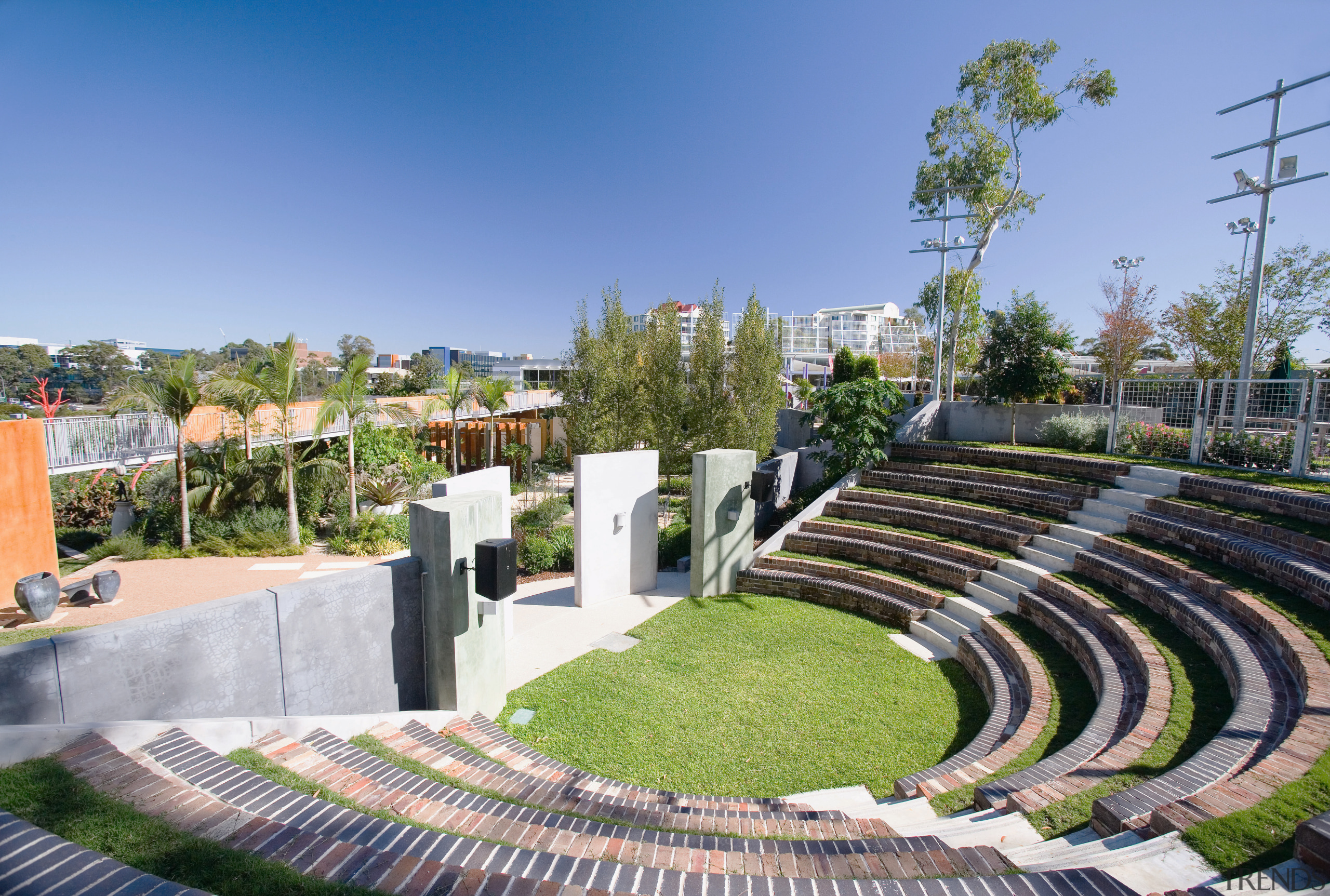 A view of the amphitheatre. - A view city, garden, grass, landscaping, mixed use, neighbourhood, real estate, residential area, tree, urban area, urban design, teal