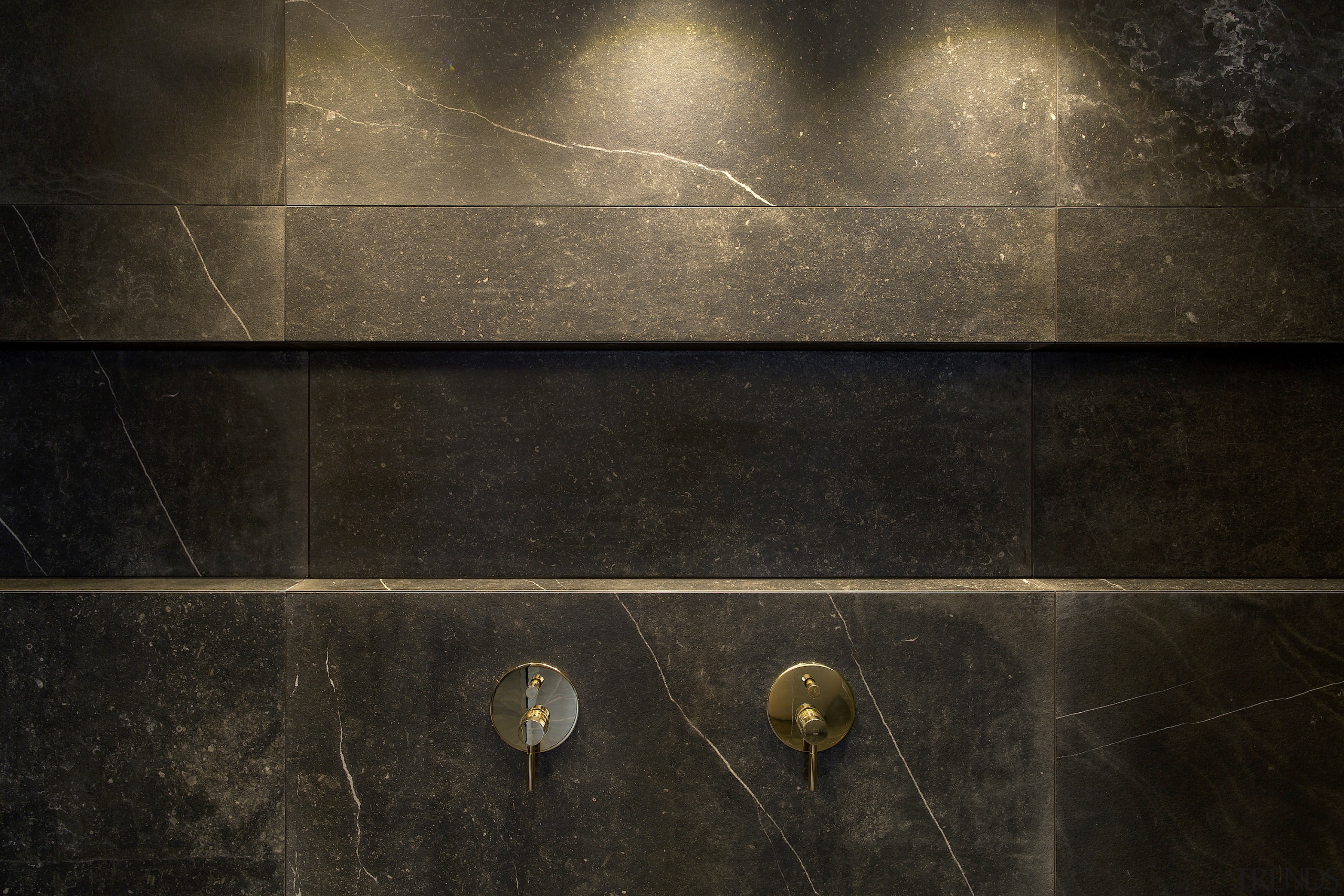 A long recessed shower niche is both handy 