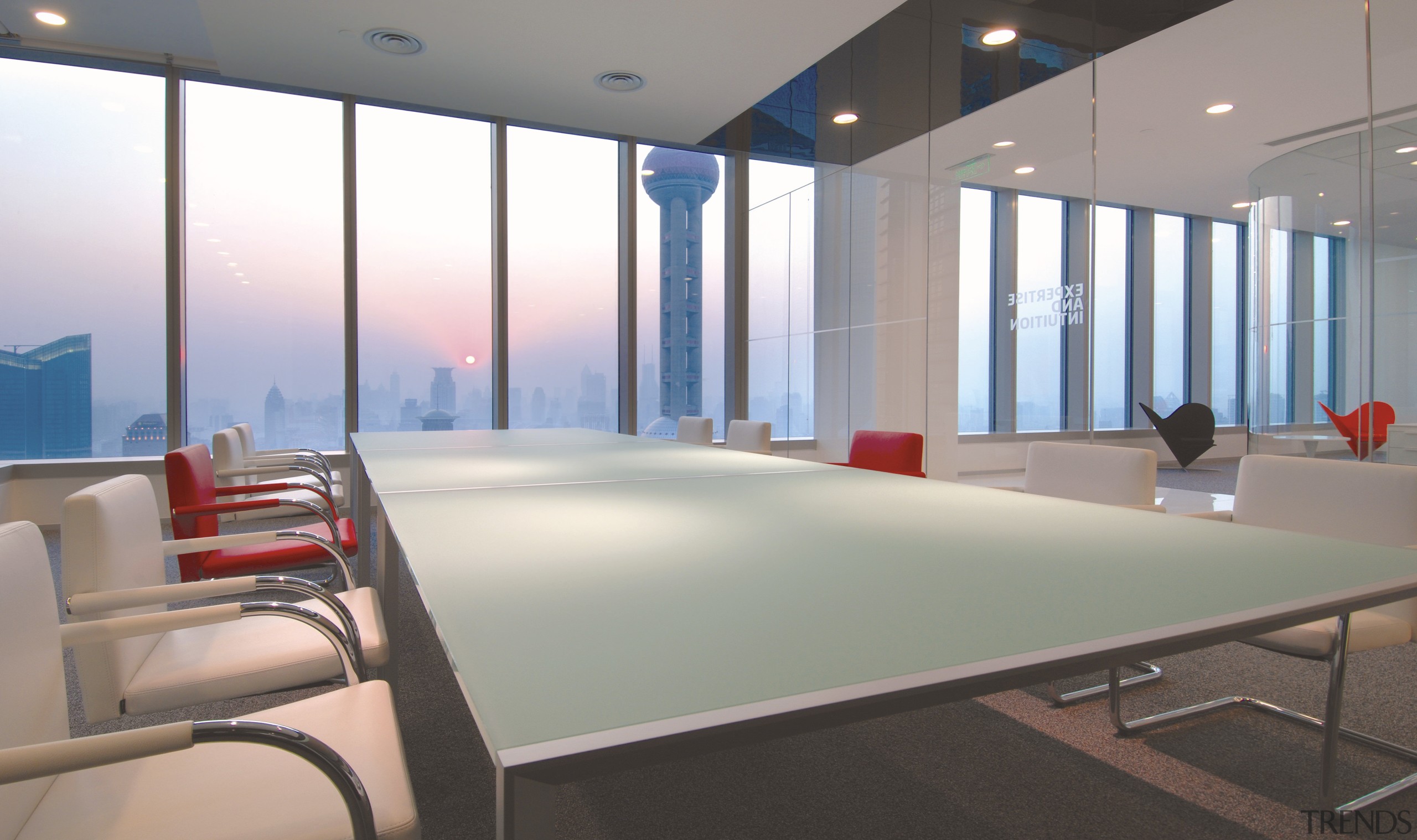 Interior view of Lloyd's Reinsurance Co. featuring stone architecture, daylighting, interior design, office, real estate, table, window, gray, white