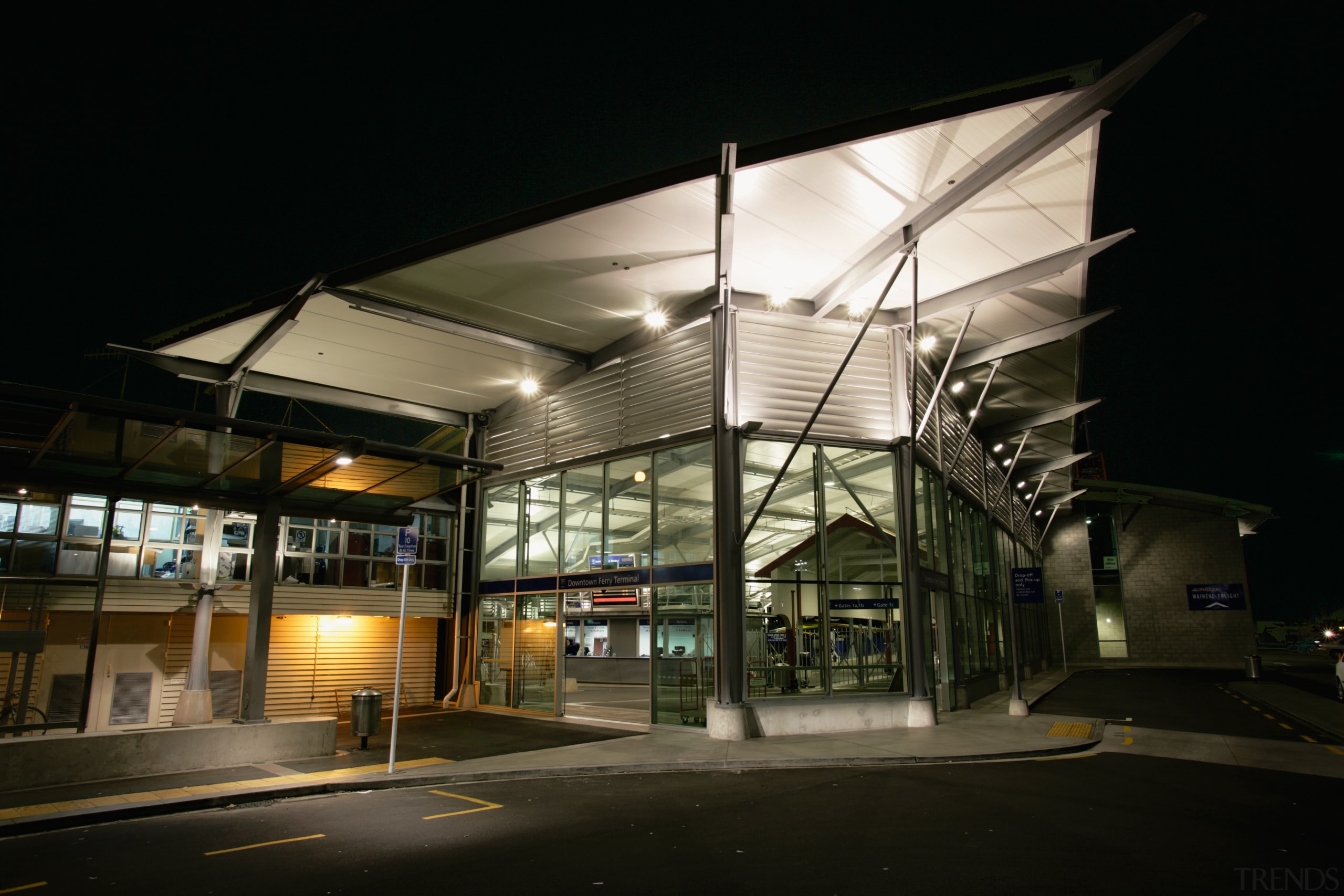 Exterior view of the new Ferry Terminal in architecture, building, metropolitan area, mixed use, night, structure, black