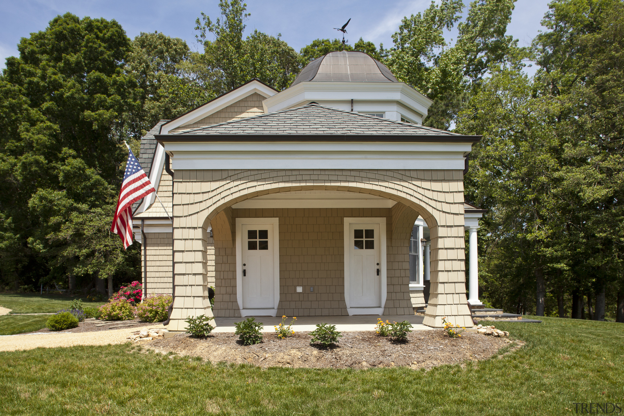 This John Malick-designed house has an air of building, cottage, estate, facade, farmhouse, historic house, home, house, property, real estate, siding, brown