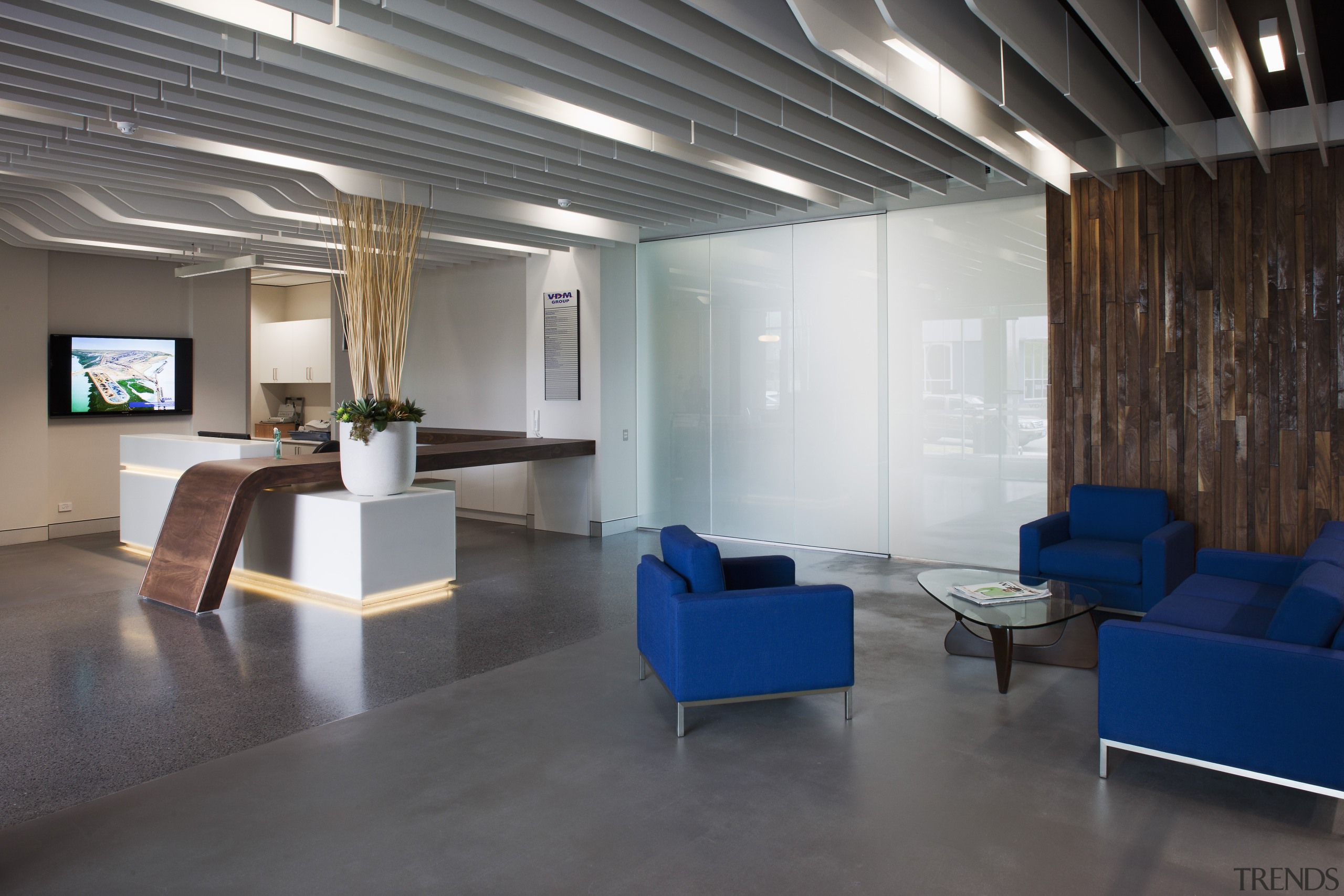 This boutique office development on a brownfields site architecture, ceiling, floor, flooring, furniture, interior design, lobby, office, real estate, table, gray