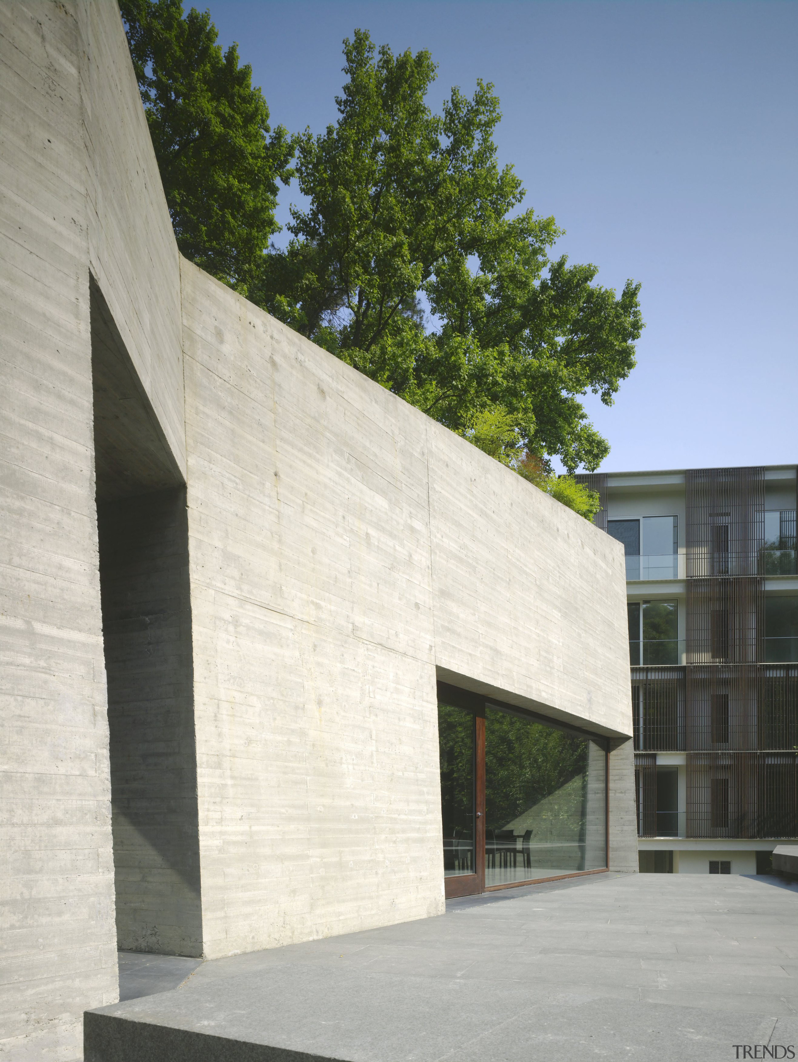 Exterior view of the clubhouse which features volcanic architecture, building, facade, house, structure, white