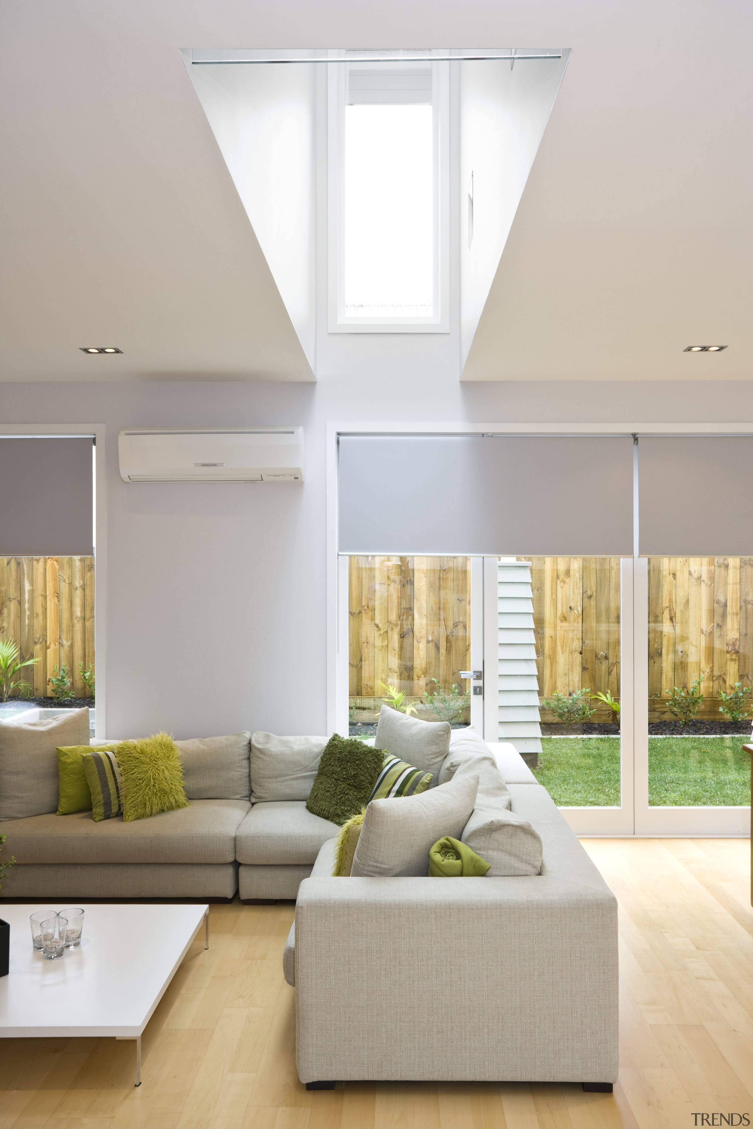 View of the living area in this house architecture, ceiling, daylighting, floor, home, house, interior design, interior designer, living room, window, gray