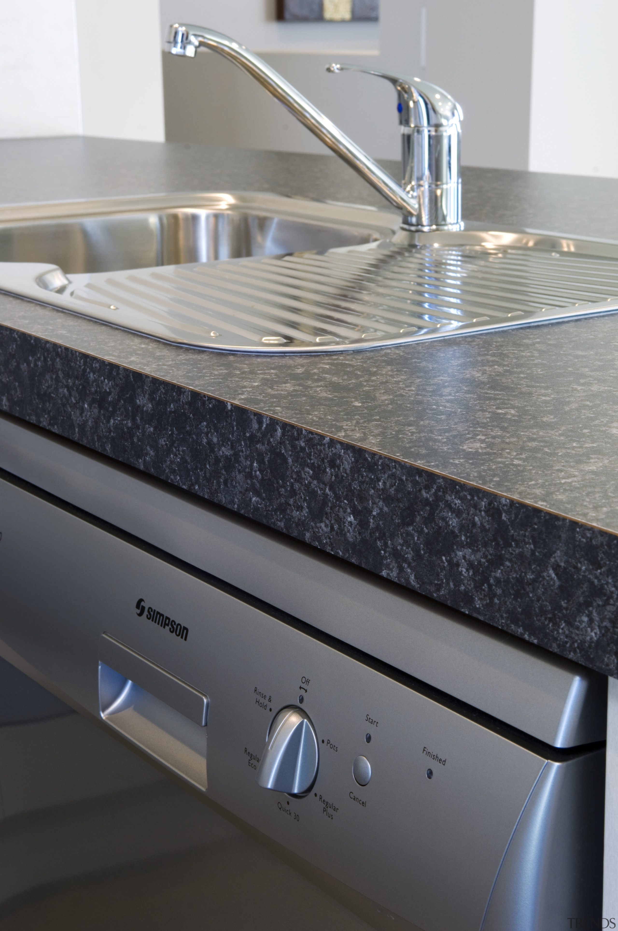 The Simpson range of appliances is desgined to countertop, kitchen, kitchen stove, sink, gray, black