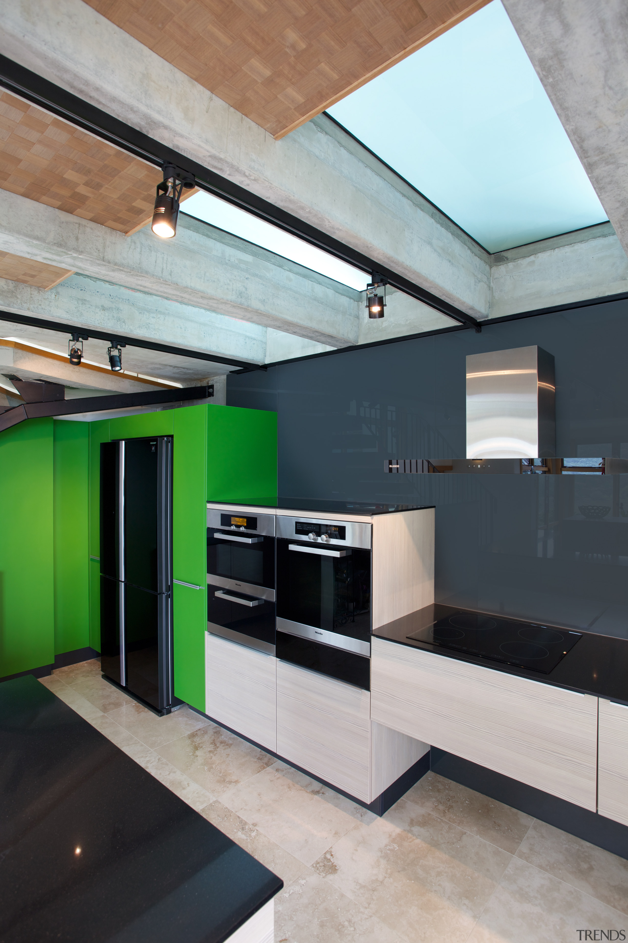 A black glass splashback and black quartz stone architecture, ceiling, daylighting, house, interior design, product design, gray, black