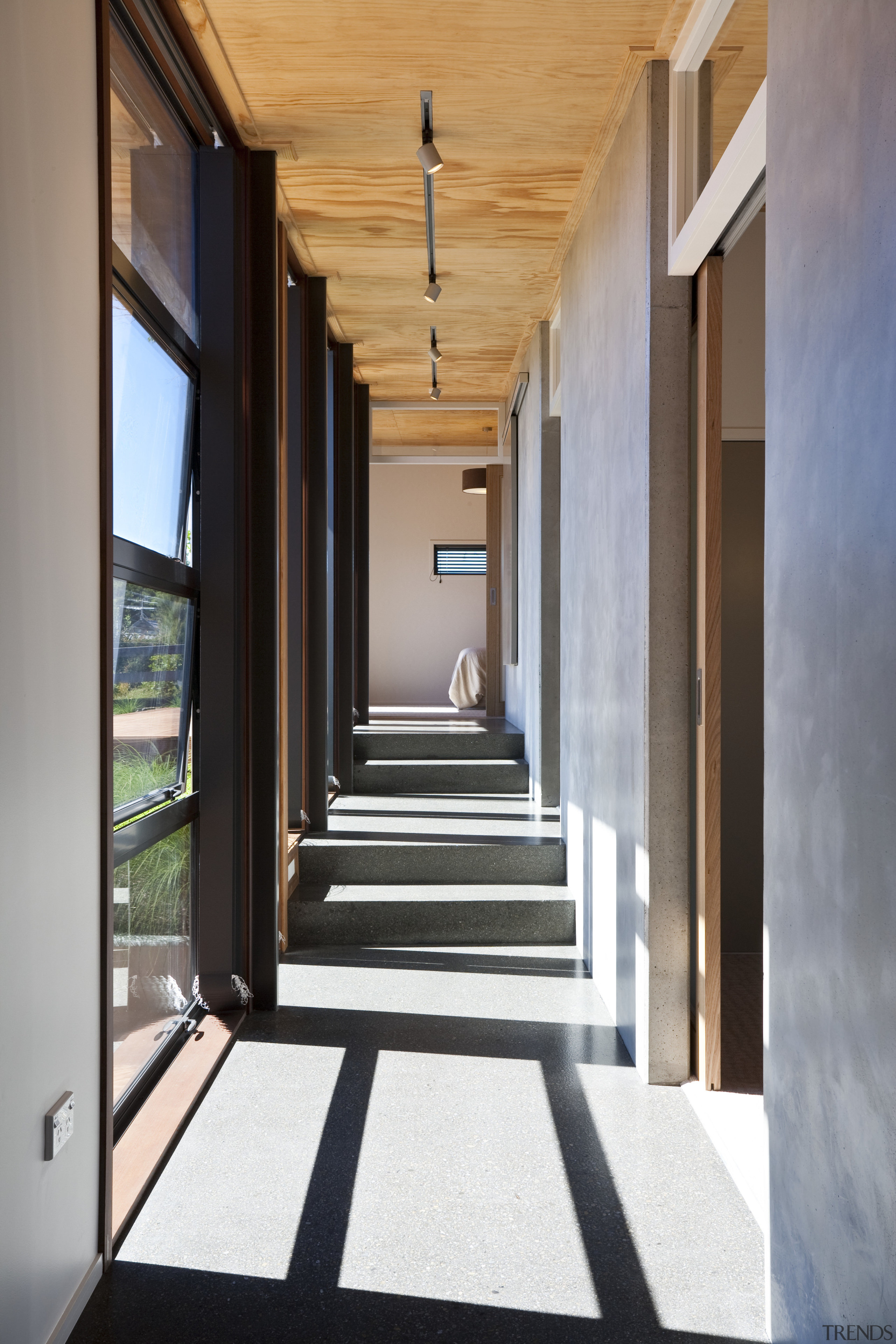 View of the a hallway which features timber architecture, ceiling, daylighting, estate, floor, flooring, home, house, interior design, real estate, window, gray