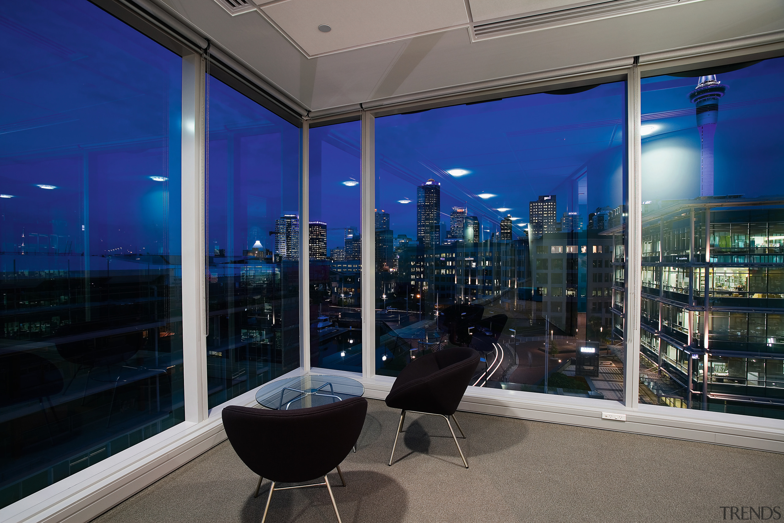 A view of the Microsoft headquarters. - A apartment, architecture, condominium, glass, interior design, real estate, sky, window, black, blue, gray