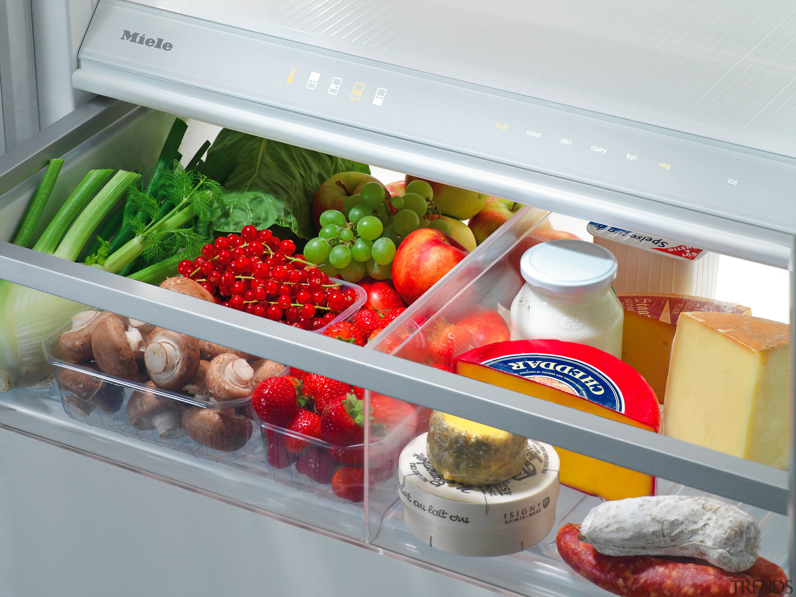 A close up view of a Miele fridge. food, produce, product, vegetable, white