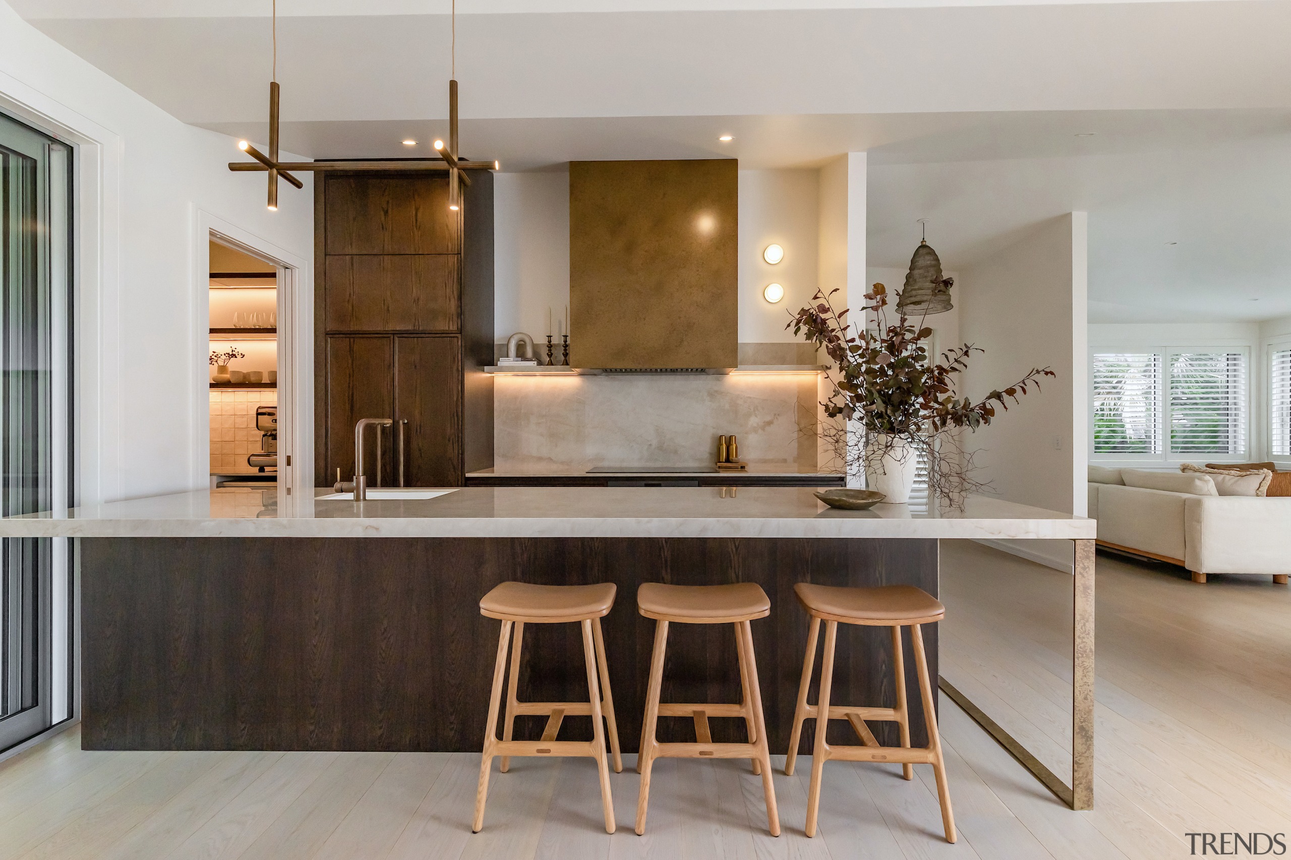 Integrated appliances and a handy scullery keep the 