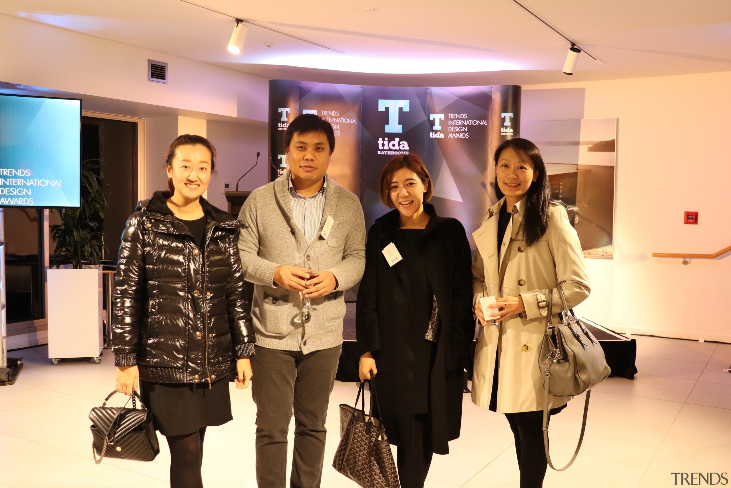 Trenz Group Cherie Ma John Zhao Elena Wang fashion, public relations, socialite, orange