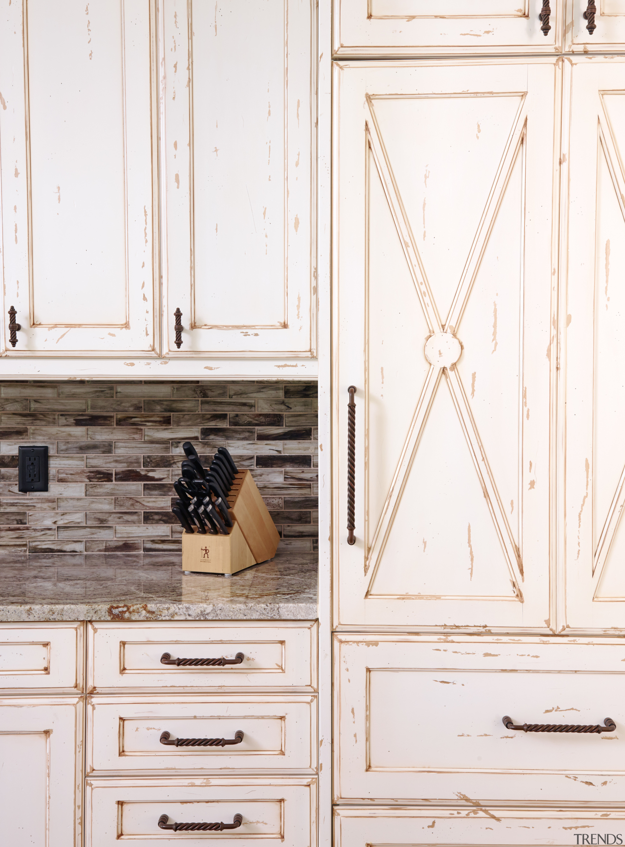 Whitewashed wood cabinetry, granite countertops and a mosaic chest of drawers, drawer, floor, furniture, wood, wood stain, white