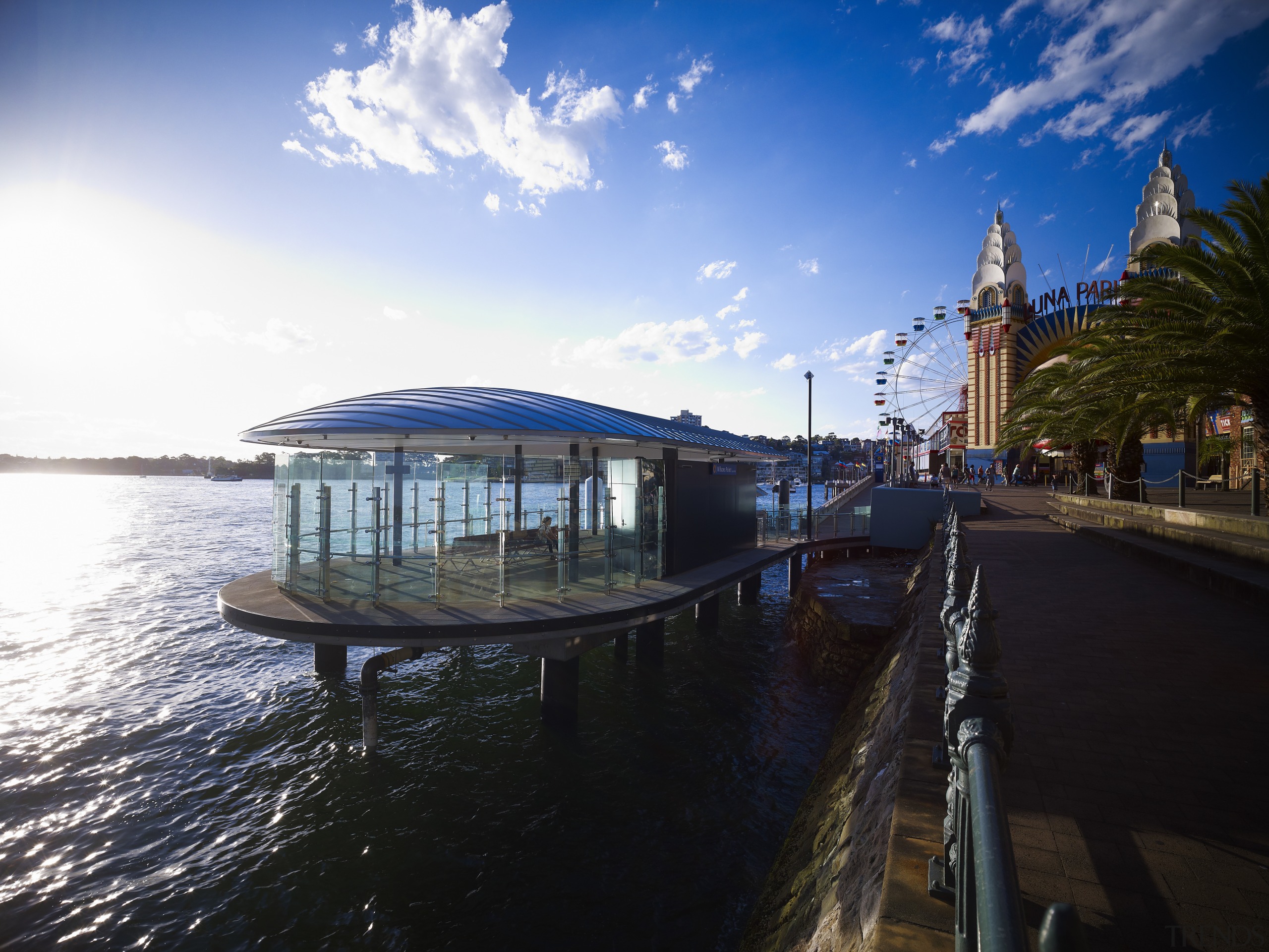 Seen here is a new building on the dock, sea, sky, water, water transportation, waterway, black