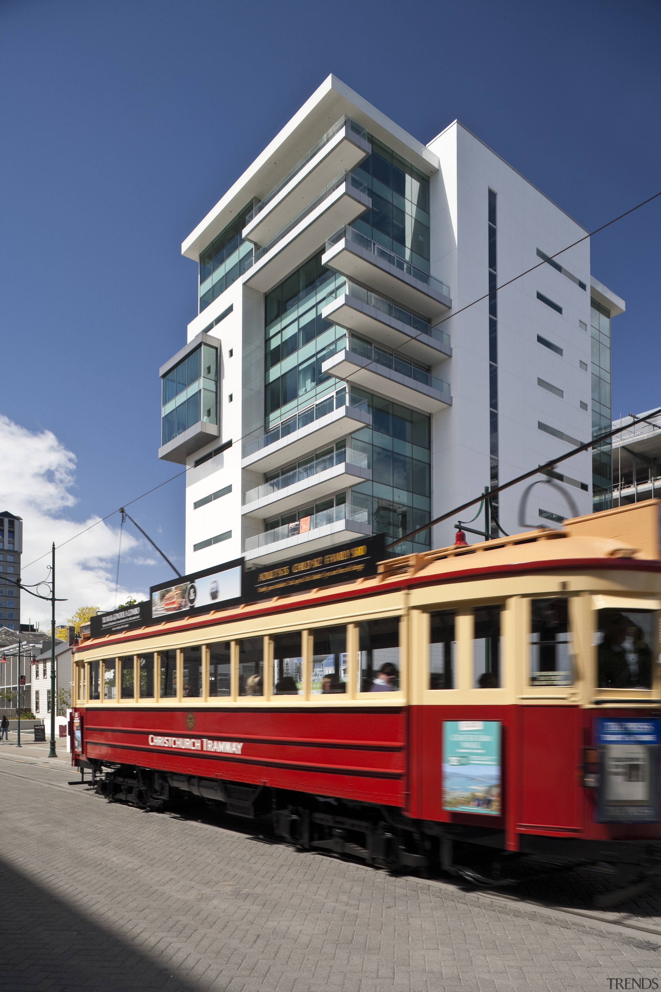 View of the Club Tower offices in Christchurch, architecture, building, cable car, condominium, downtown, facade, metropolis, metropolitan area, mixed use, neighbourhood, public transport, residential area, rolling stock, tram, transport, urban area, gray