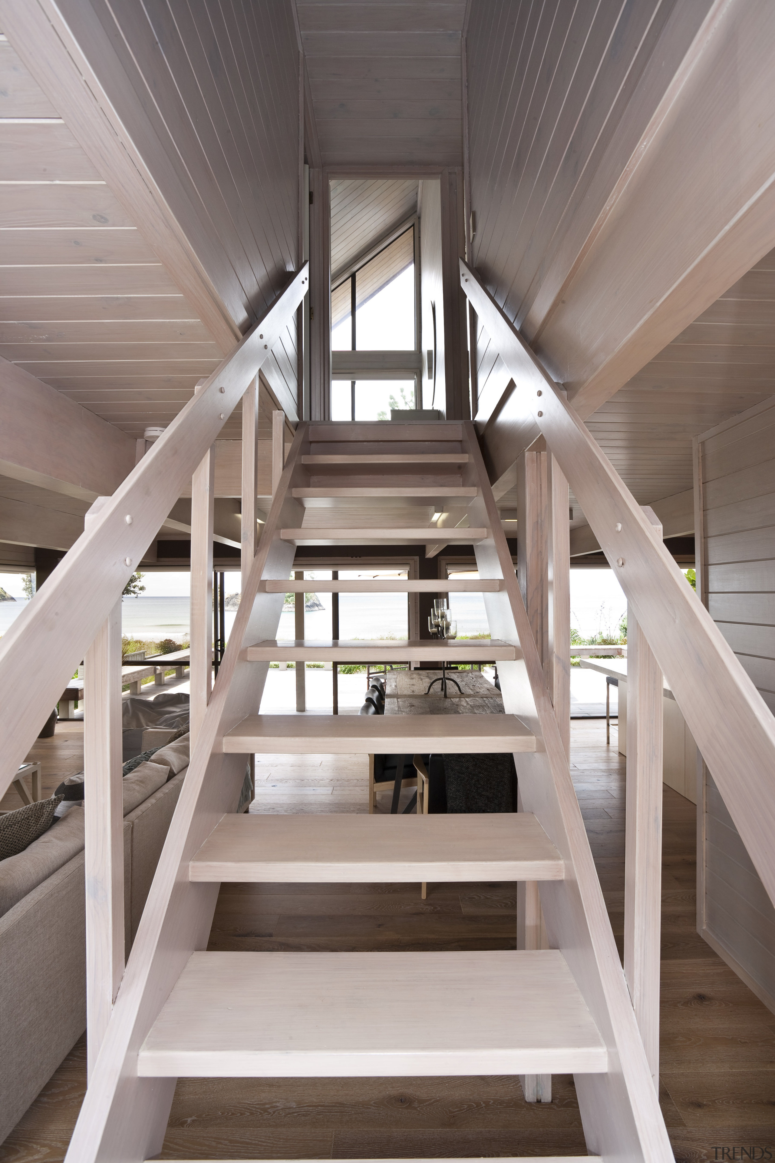 View of renovated beach house with interior design architecture, daylighting, house, stairs, structure, wood, gray, brown