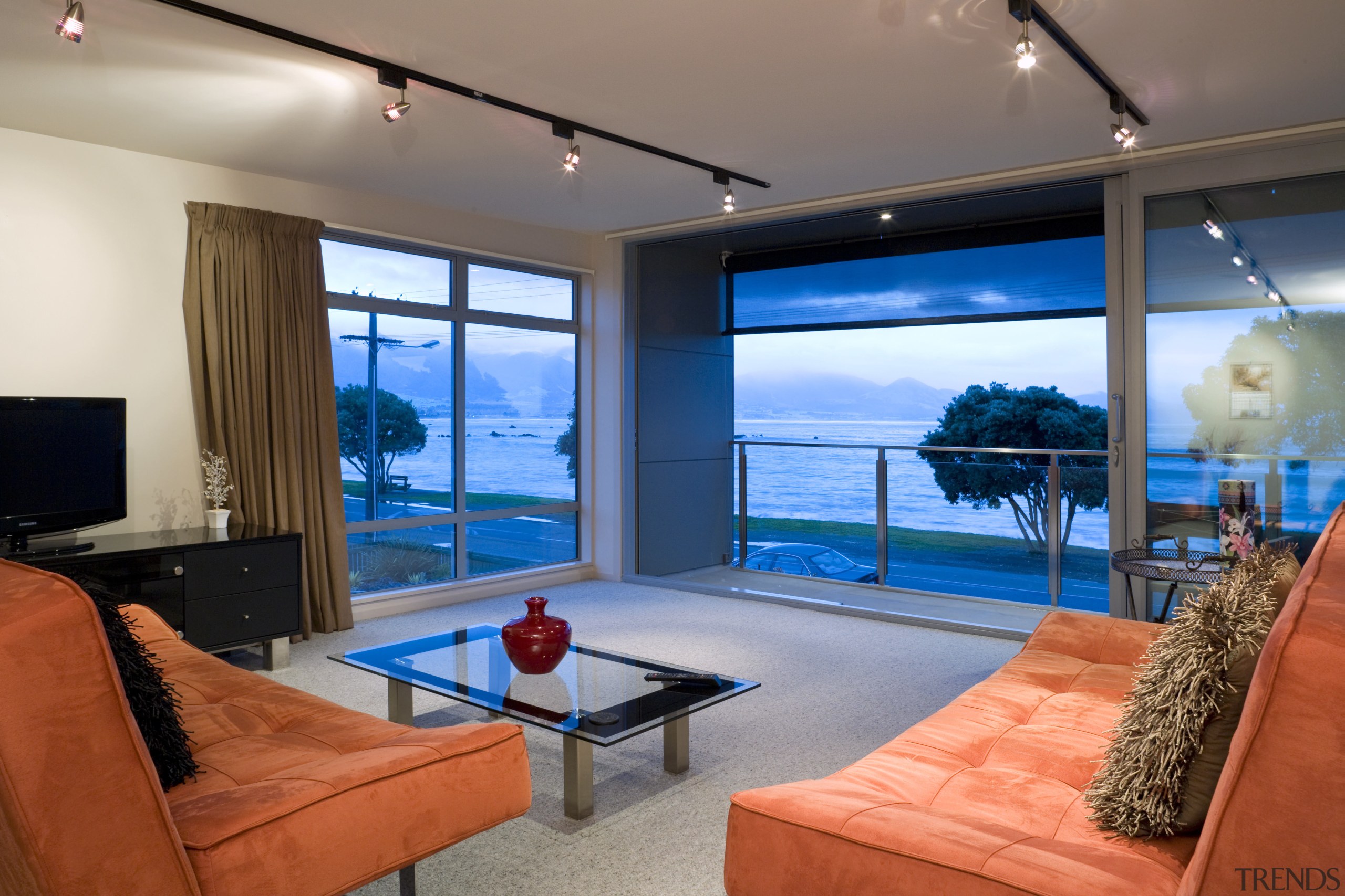 The upper level offers a second living room ceiling, estate, home, interior design, living room, penthouse apartment, property, real estate, room, window, gray