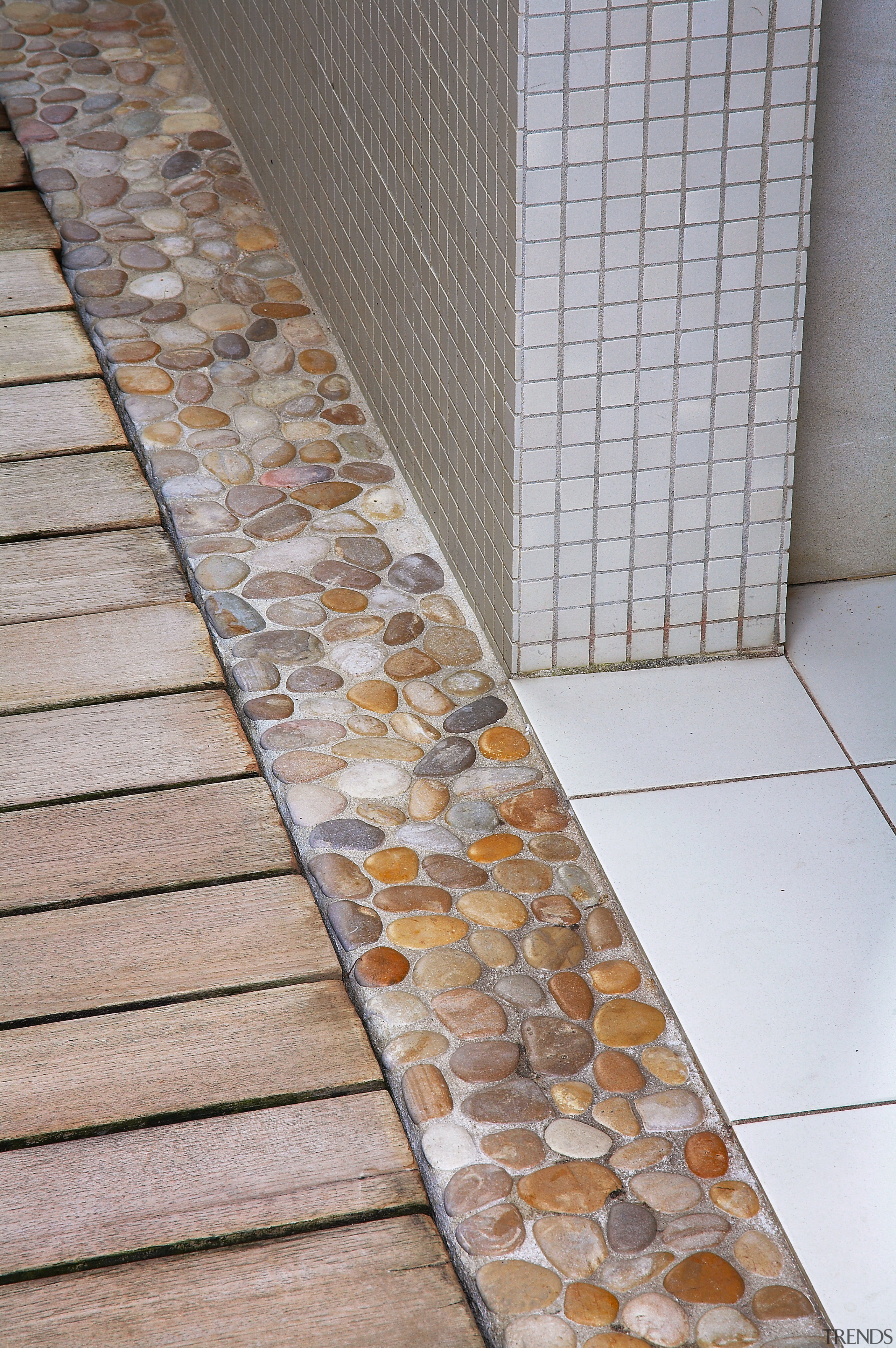 A view of the wood slate boardwalk and floor, flooring, tile, wall, gray