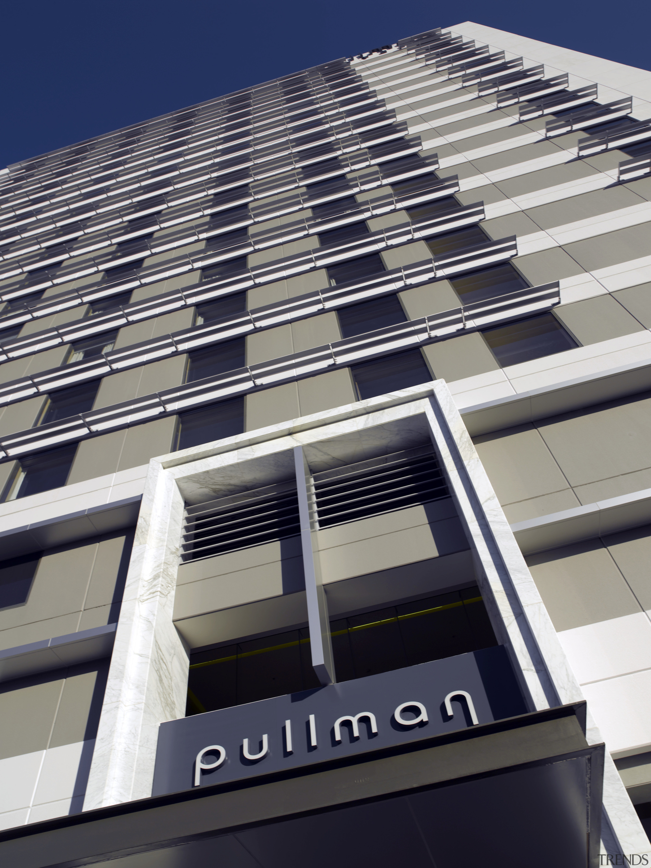 Exterior view of the Pullman hotel where the architecture, building, commercial building, condominium, corporate headquarters, daylighting, daytime, facade, headquarters, landmark, line, metropolis, metropolitan area, skyscraper, tower block, urban area, gray