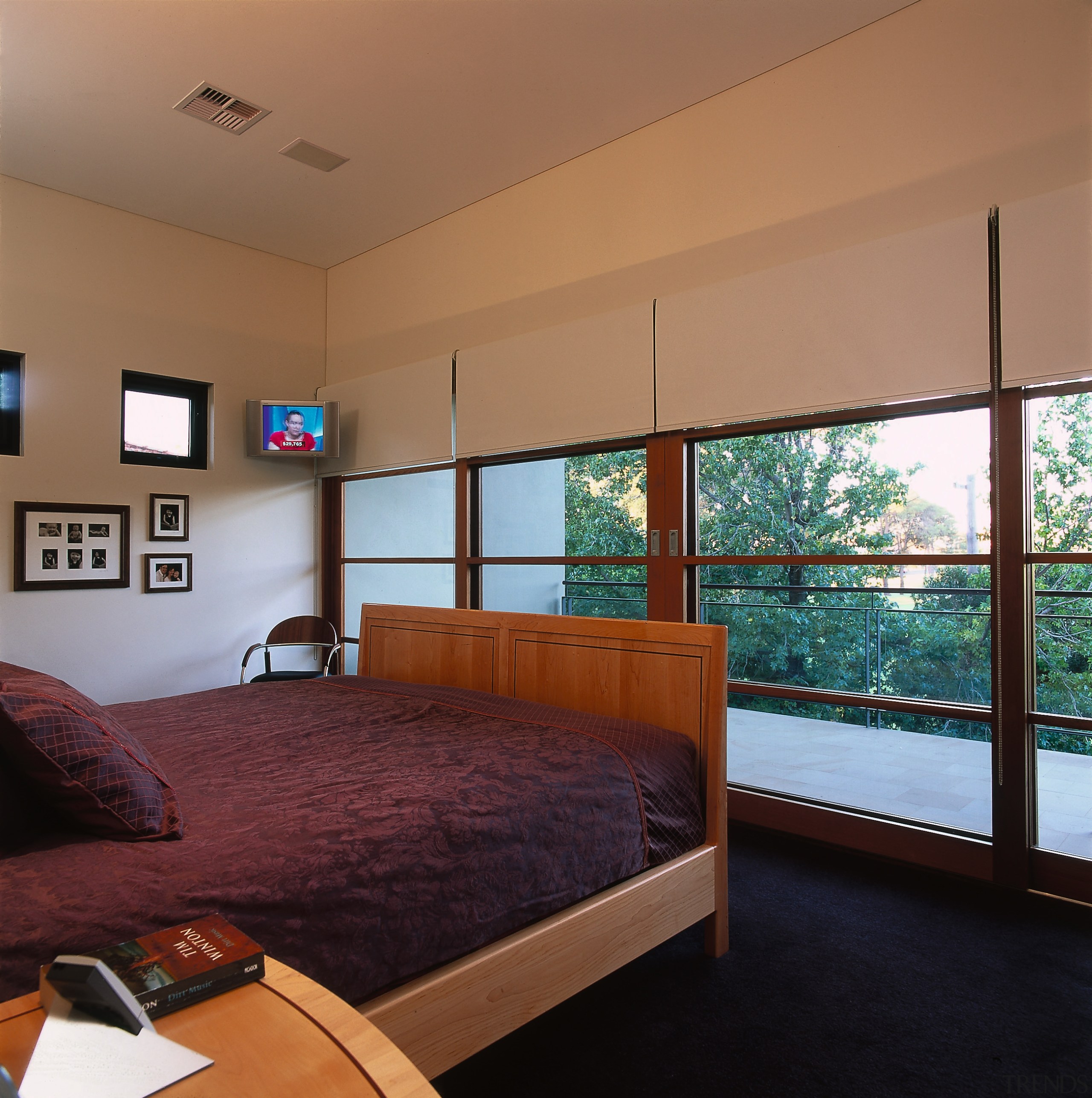 A view of the master bedroom that over architecture, bedroom, ceiling, house, interior design, real estate, room, wall, window, wood, brown, black