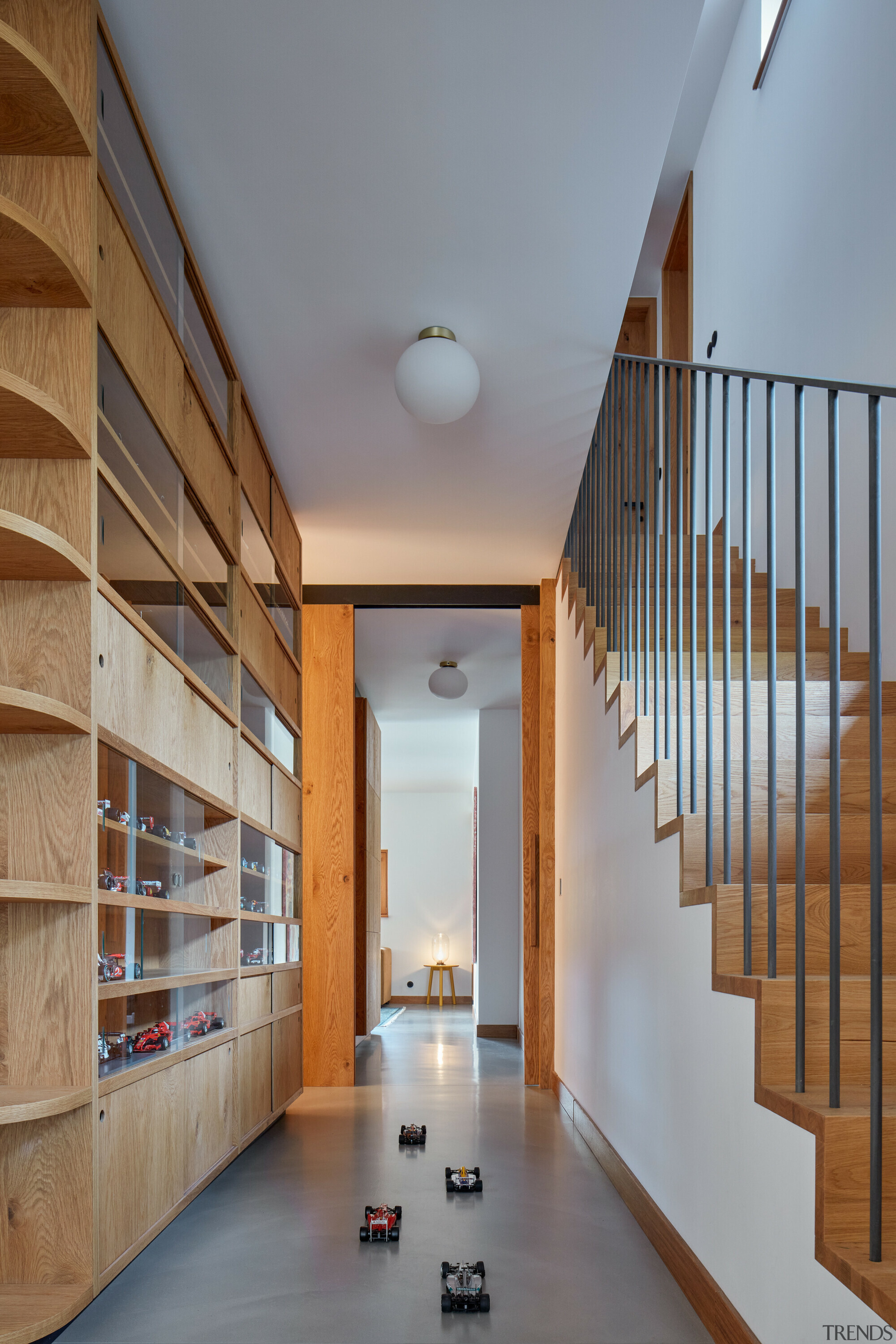 A model display cabinet inhabits one wall of 