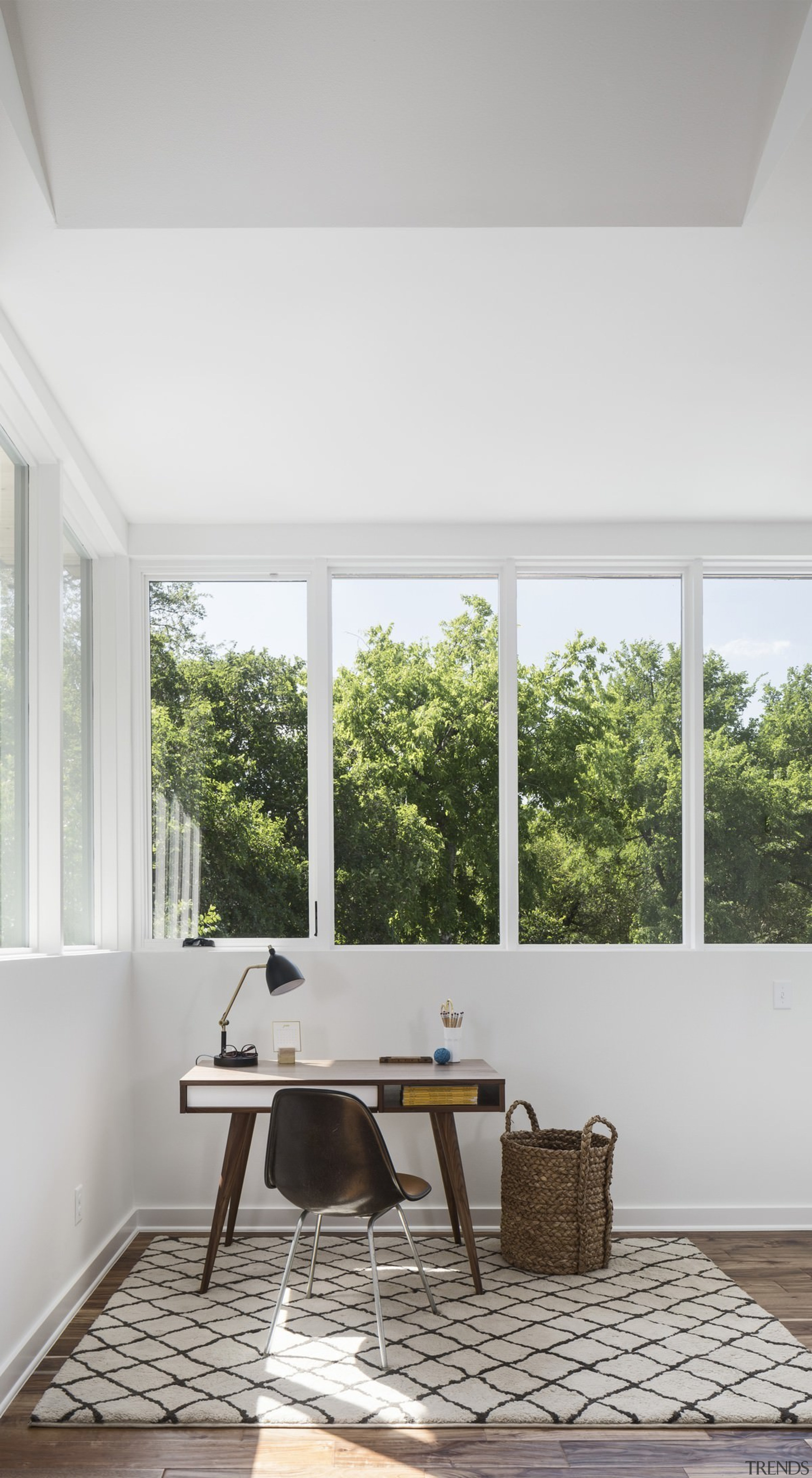 The large windows make the desk seem quite architecture, ceiling, chair, daylighting, floor, furniture, home, house, interior design, living room, table, window, gray