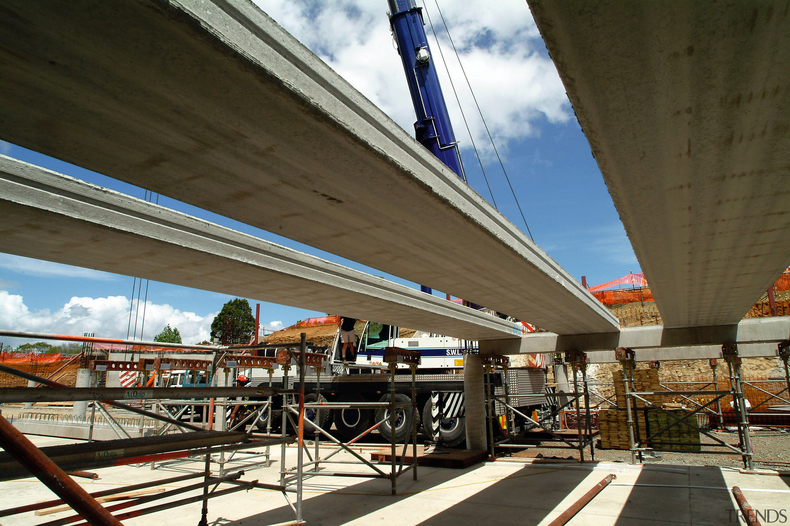 A view of some reinforced concrete planks from architecture, bridge, fixed link, metropolitan area, overpass, sky, skyway, structure, transport, brown