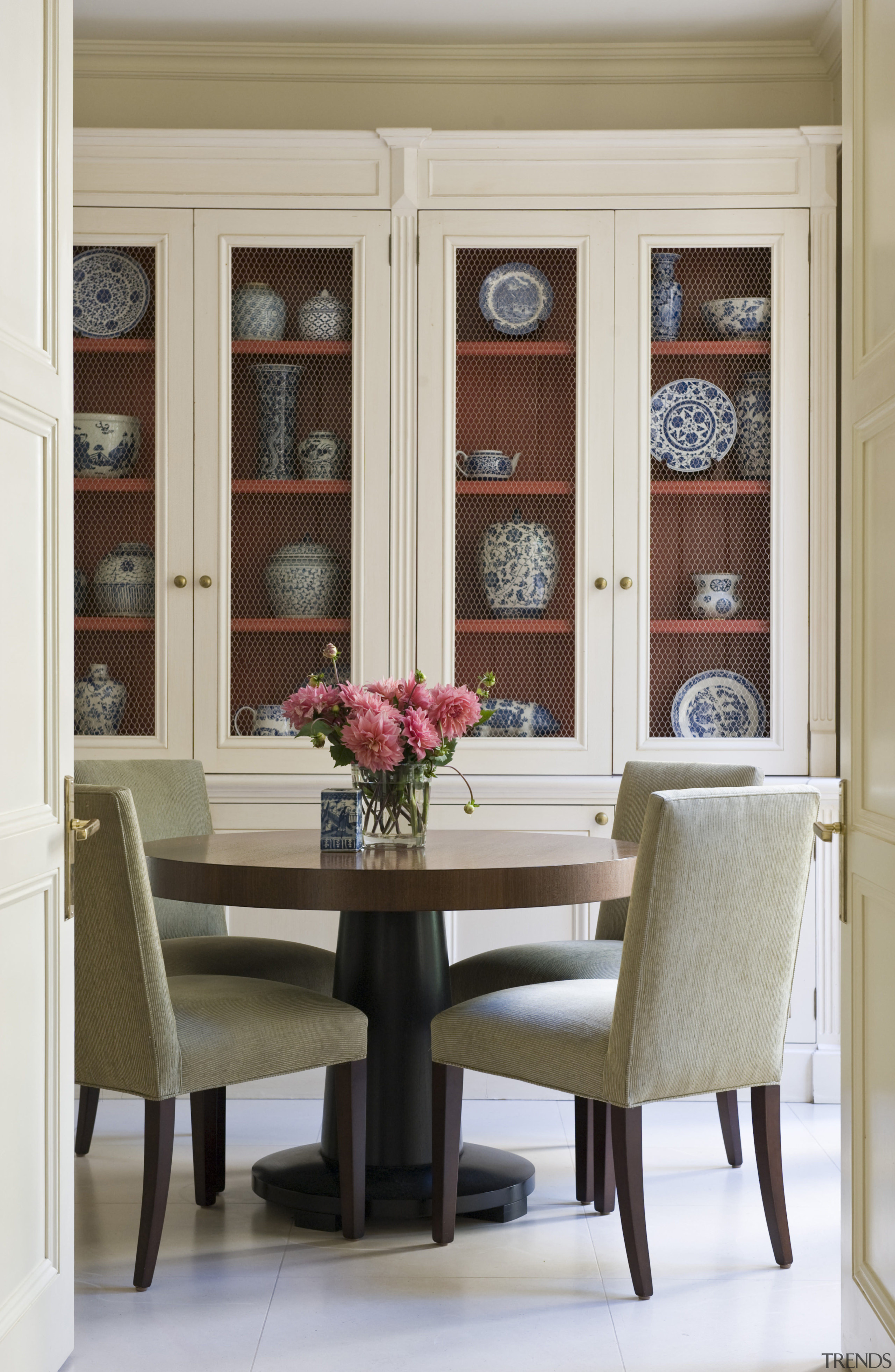 View of home by interior designer Cameron Kimber. cabinetry, chair, dining room, door, furniture, home, interior design, living room, room, table, window, window covering, gray