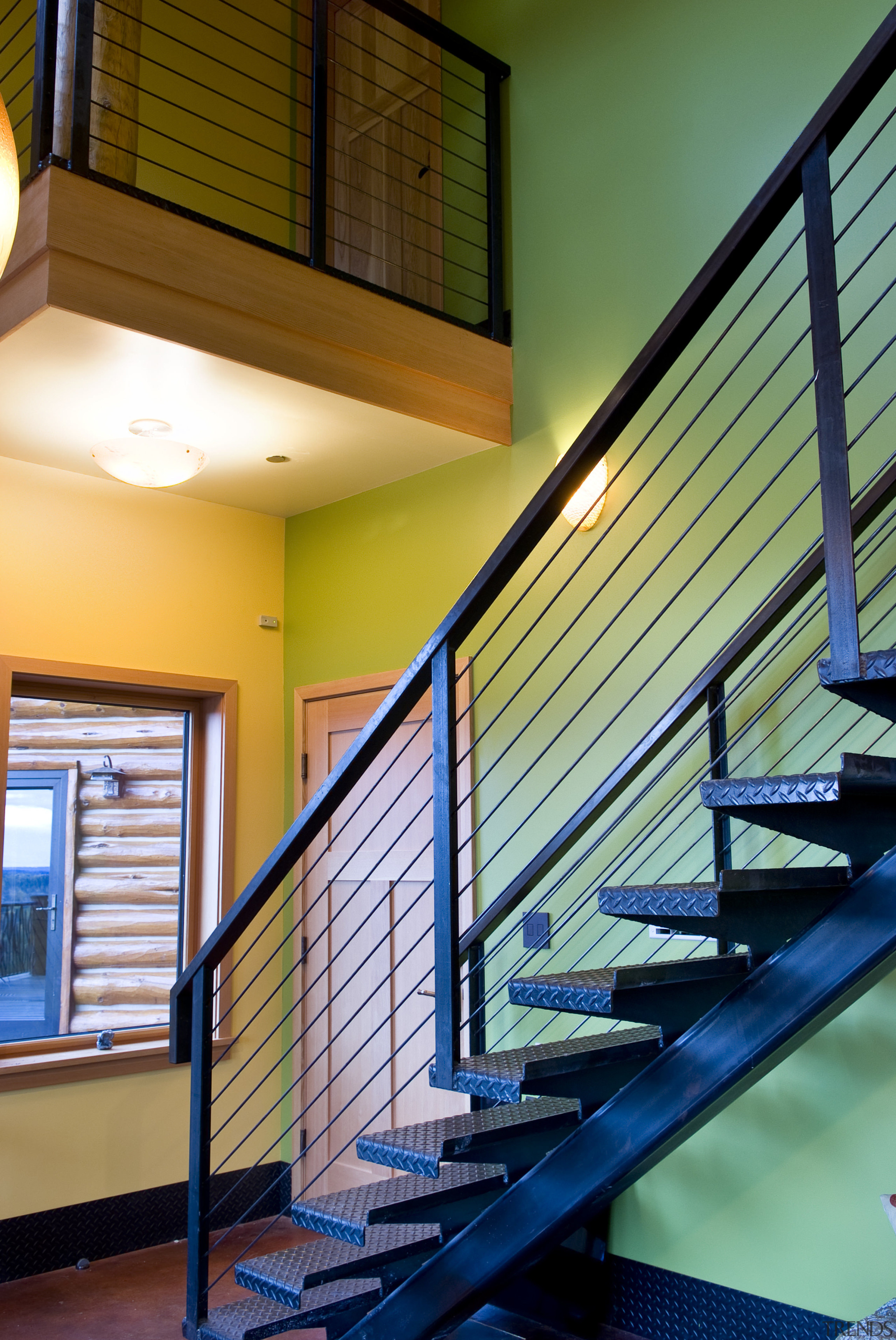 Interior image this home which feature steel by architecture, balcony, daylighting, estate, glass, handrail, home, house, interior design, lighting, real estate, stairs, wall, window, wood