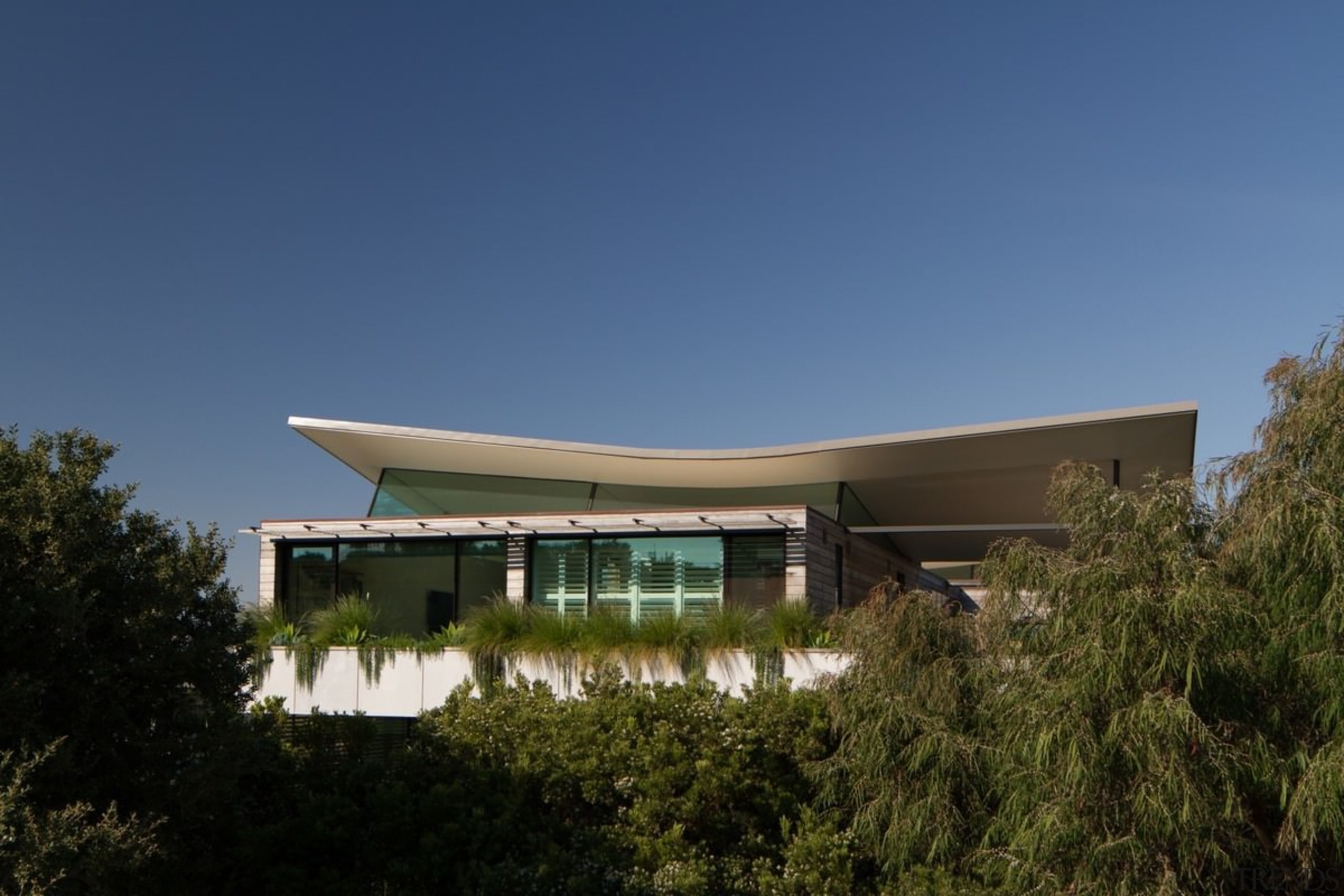 Like an open book, the roof angles up architecture, building, corporate headquarters, headquarters, house, real estate, sky, blue