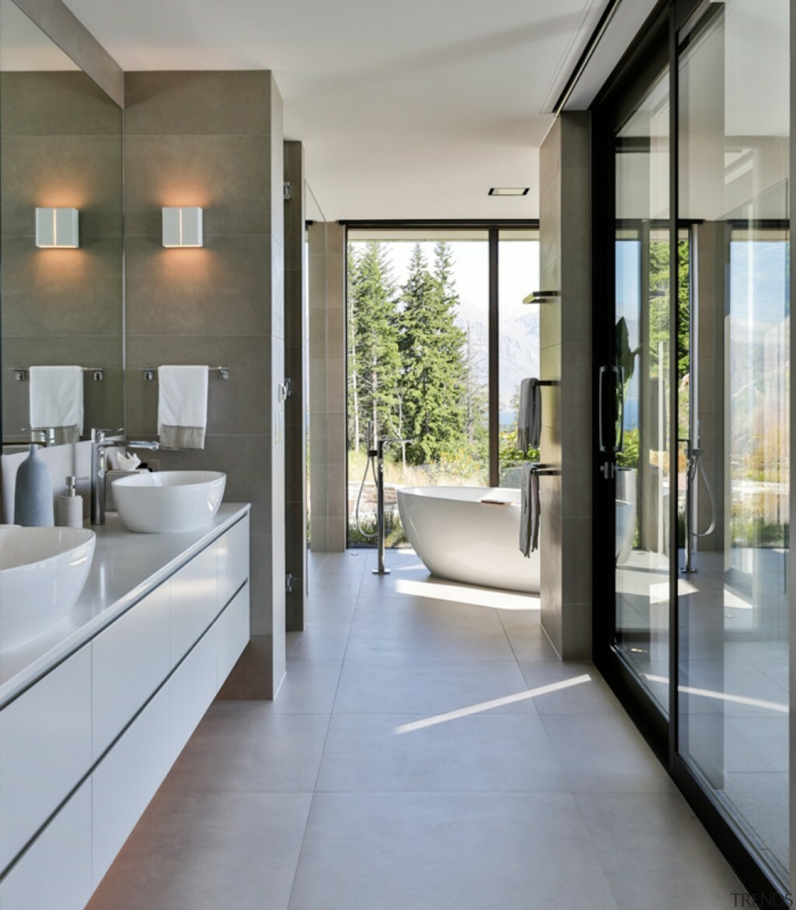 The master bathroom enjoys an abundance of natural 