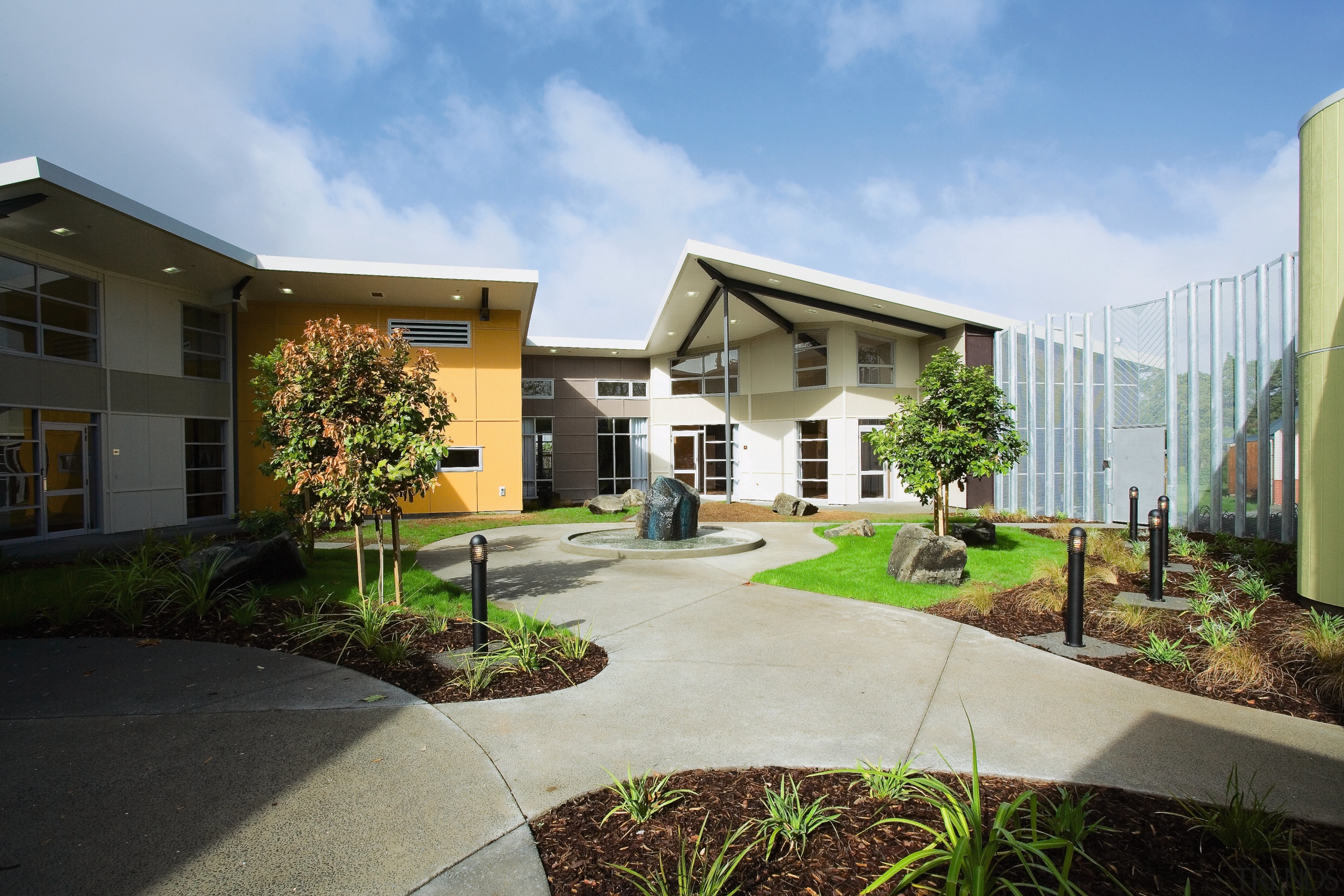 An exterior view of the health centre. - architecture, condominium, corporate headquarters, courtyard, estate, facade, home, house, mixed use, neighbourhood, property, real estate, residential area