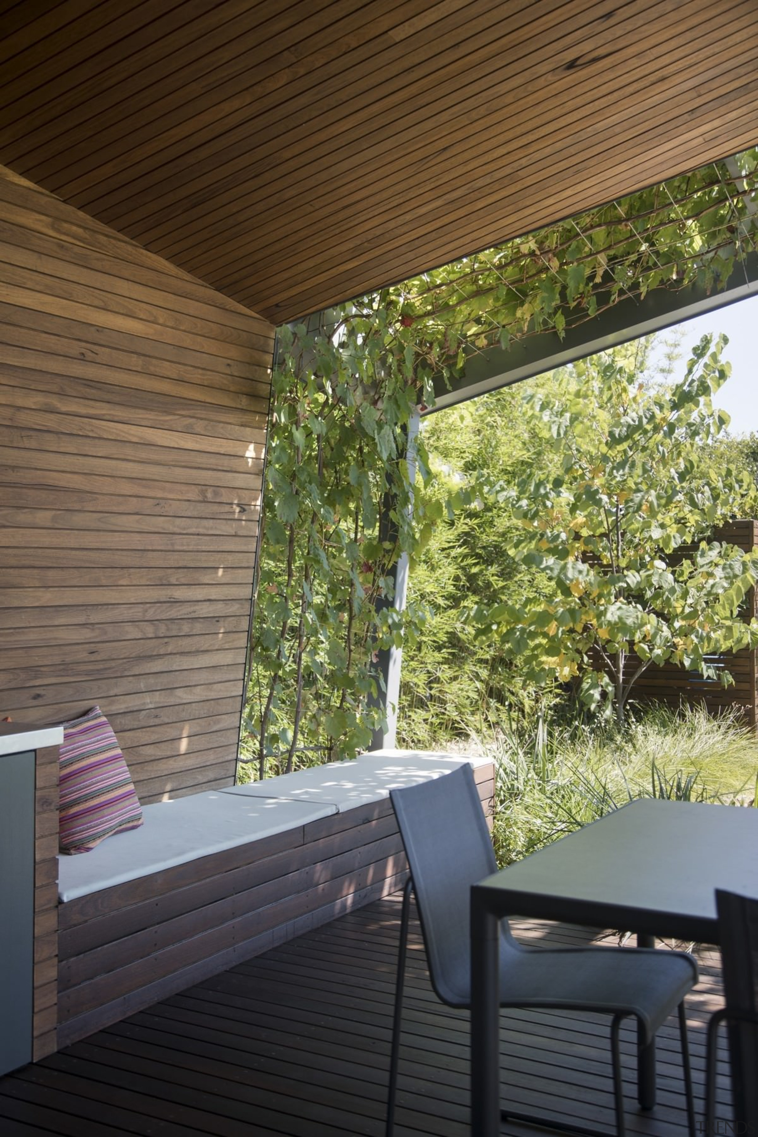 The wood panelling gives this sheltered outdoor room architecture, backyard, ceiling, daylighting, home, house, interior design, outdoor structure, porch, property, real estate, roof, shade, wall, window, wood, yard, brown