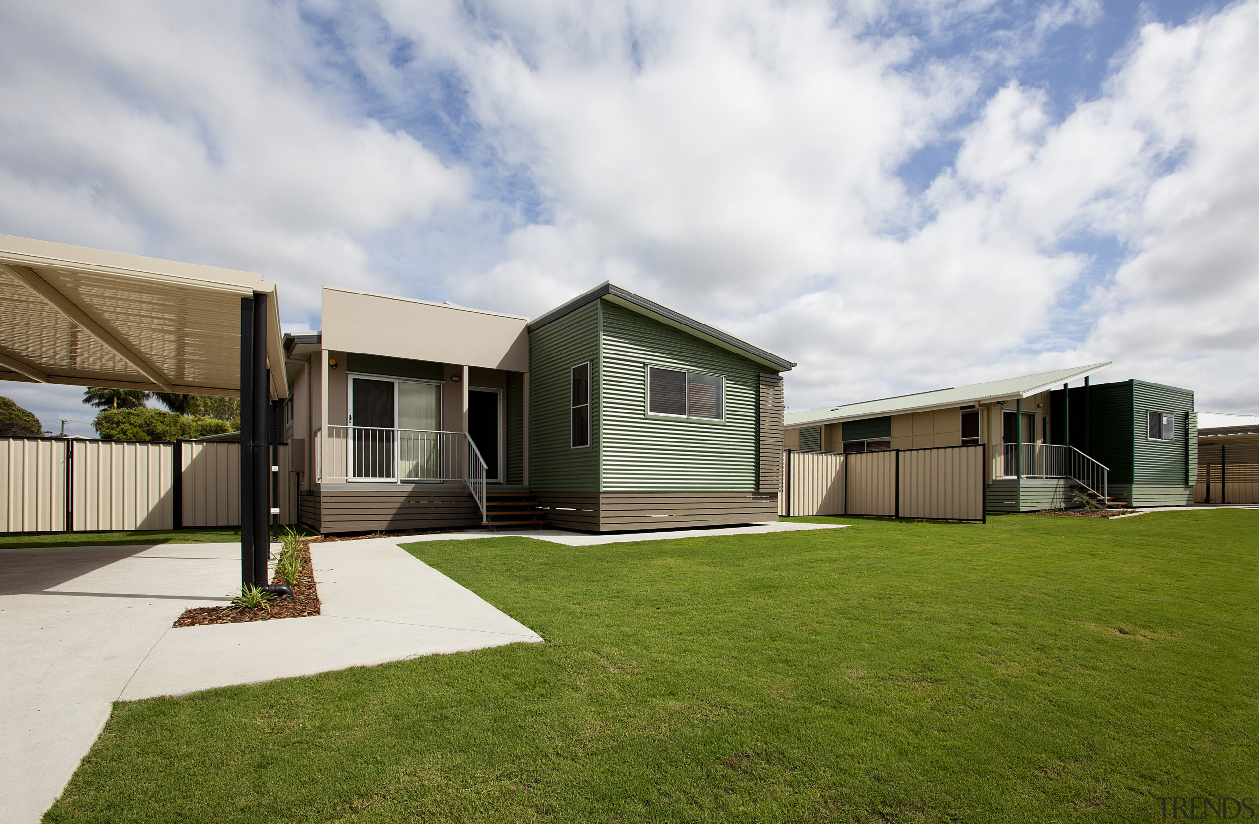 View of building by Hutchinson Builders. - View architecture, cottage, elevation, estate, facade, home, house, property, real estate, residential area, siding, white, brown