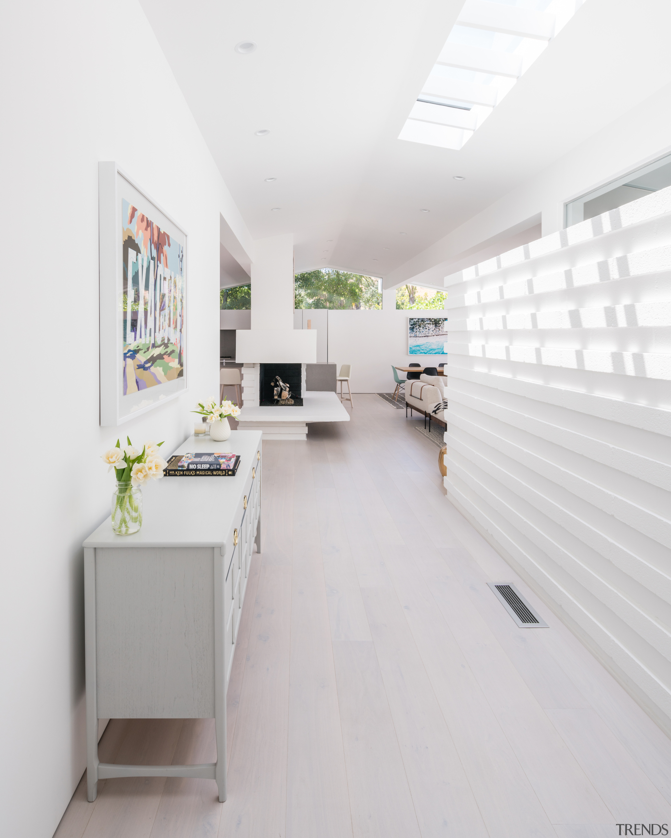 Skylights fill the living spaces and connecting spaces 