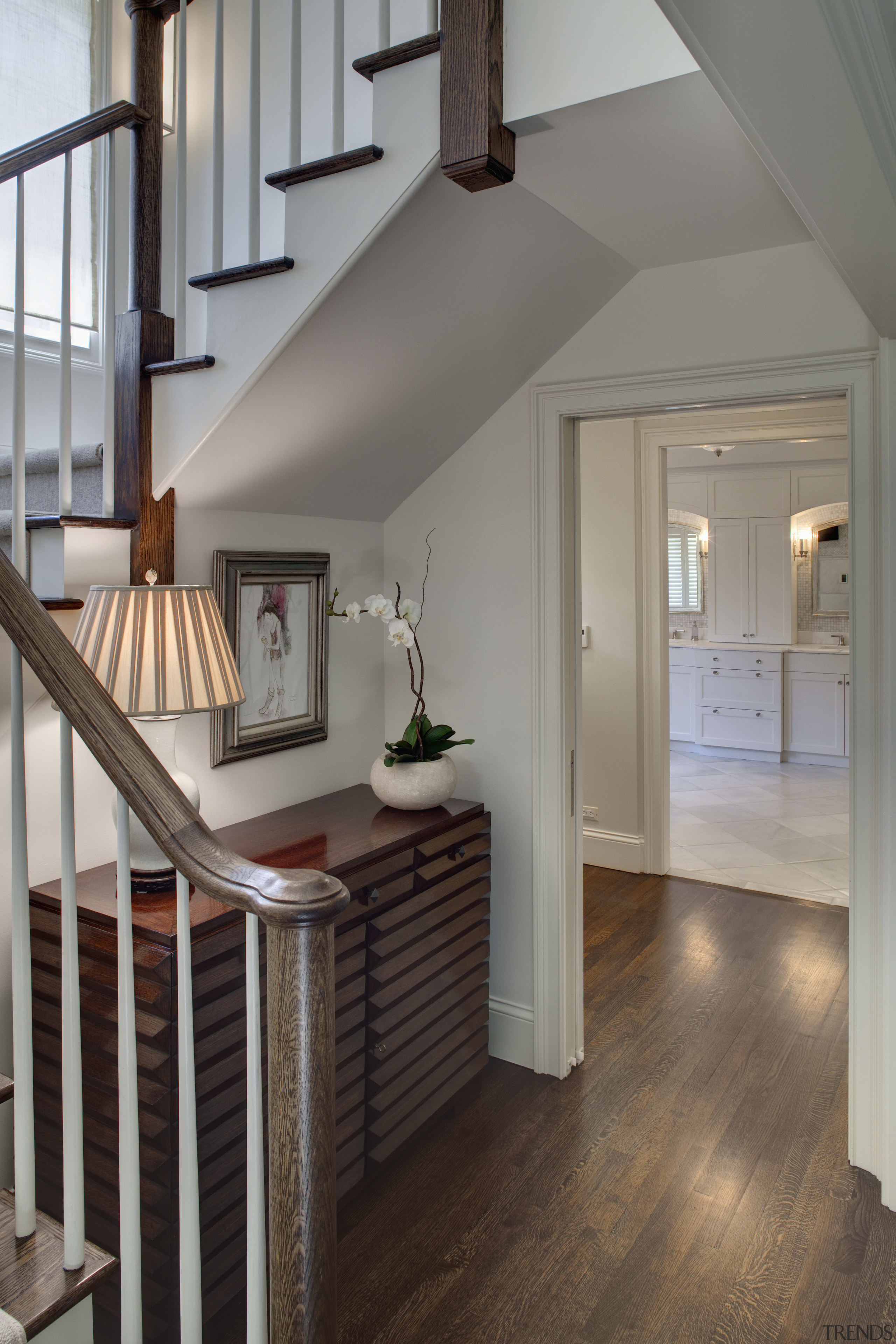 View of the bathroom foyer between the master ceiling, daylighting, floor, flooring, hardwood, home, interior design, laminate flooring, living room, loft, room, stairs, wall, window, wood, wood flooring, gray